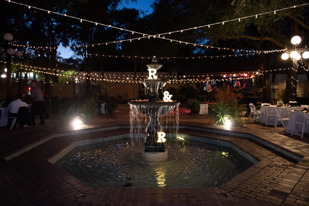 Ybor City Museum Garden Wedding water fountain by the lights evening wedding reception