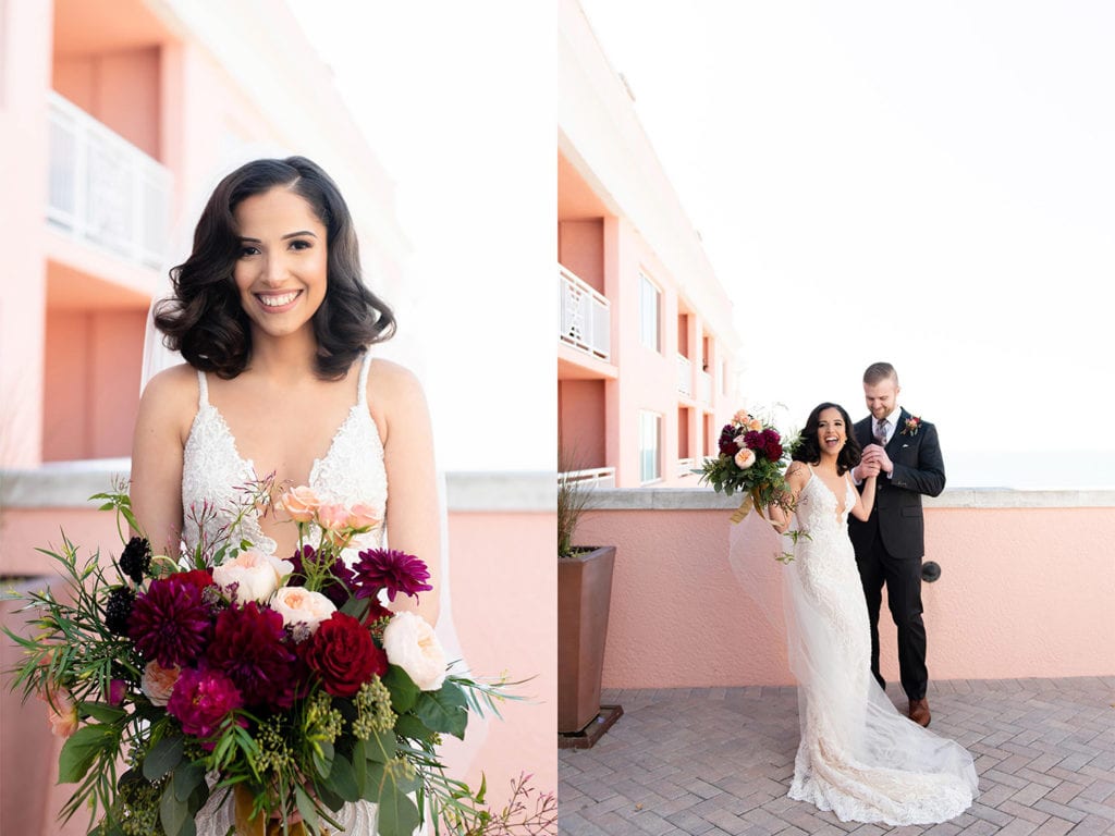 Hyatt Regency Clearwater Beach Wedding Bride in Galia Lahav sexy sicilian dress holding red and pink bouquet celebrating with her groom in the sky terrace by the beach