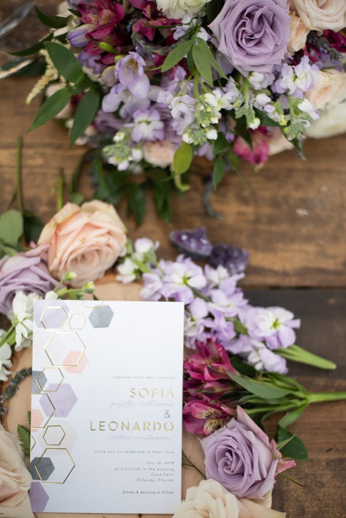 Basic Invite Modern Geometric Wedding Invitations with purple and blush flowers on wood