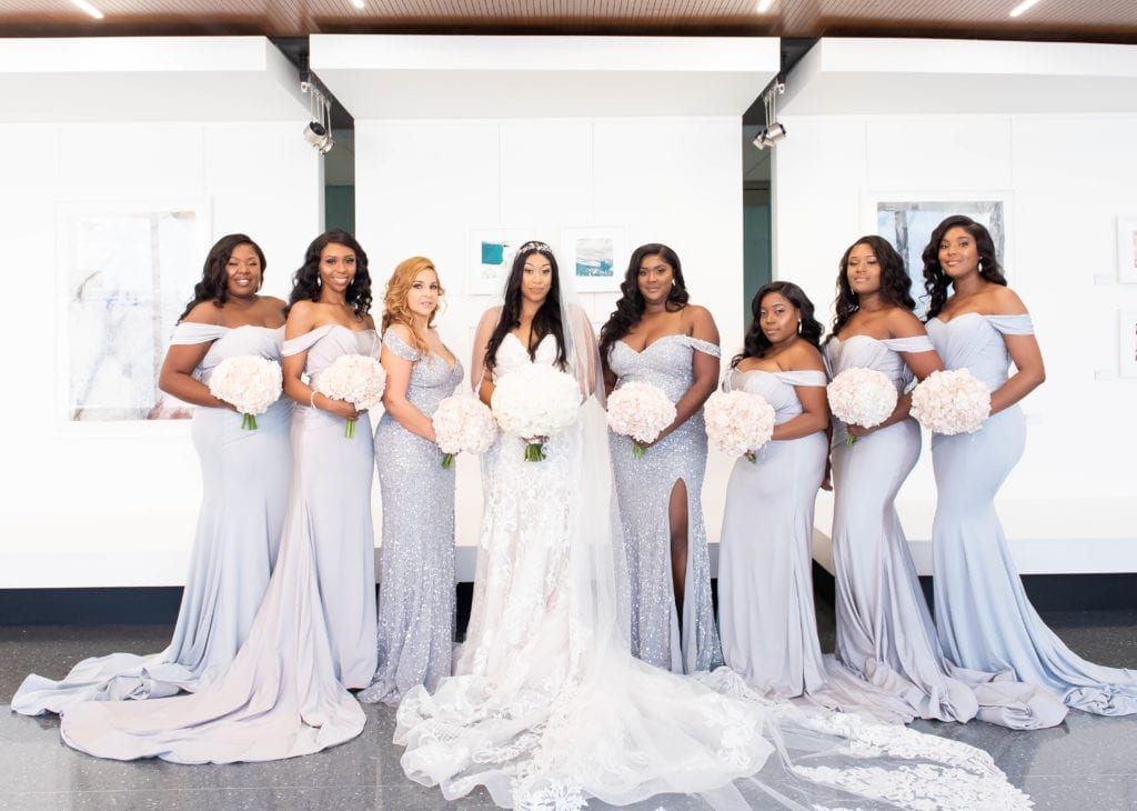 Tampa airport marriott hotel bride and bridesmaids in silver long fancy dresses formal photo