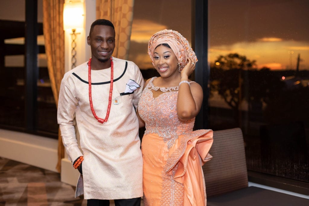 tampa airport marriott sunset bride and groom portrait in haitian nigerian wedding traditional outfits