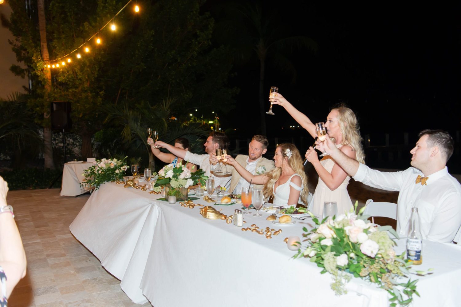 wedding reception toast by maid of honor at florida beach outdoor wedding