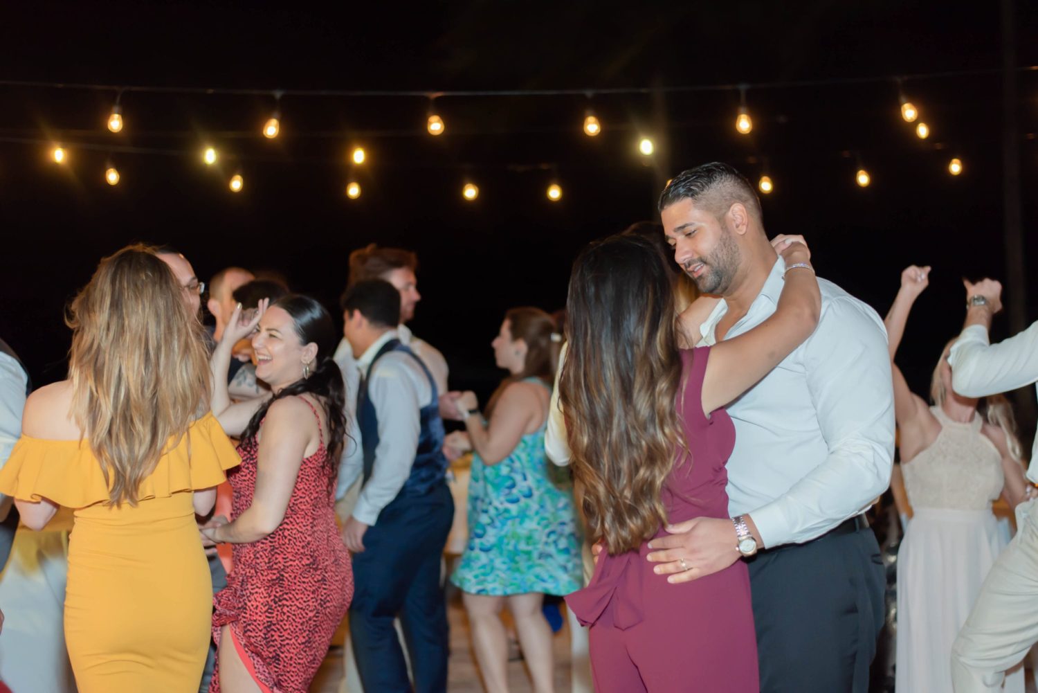 wedding guests dancing during reception at florida outdoor wedding