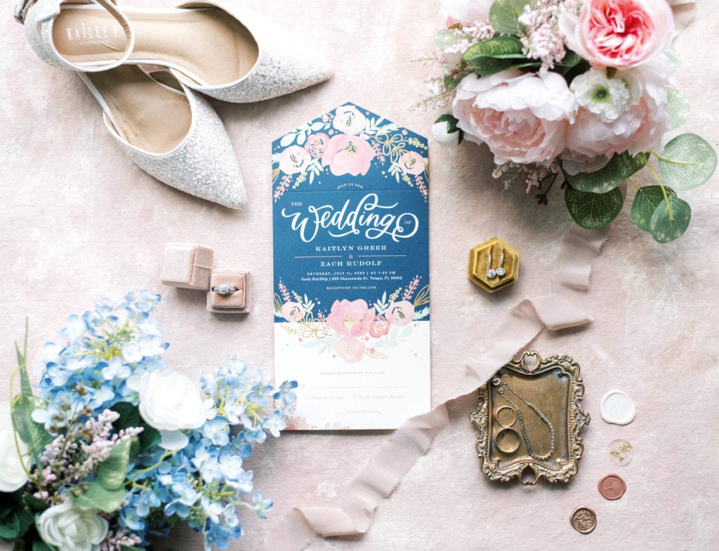 blush and navy wedding invitations flat lay wedding details photo