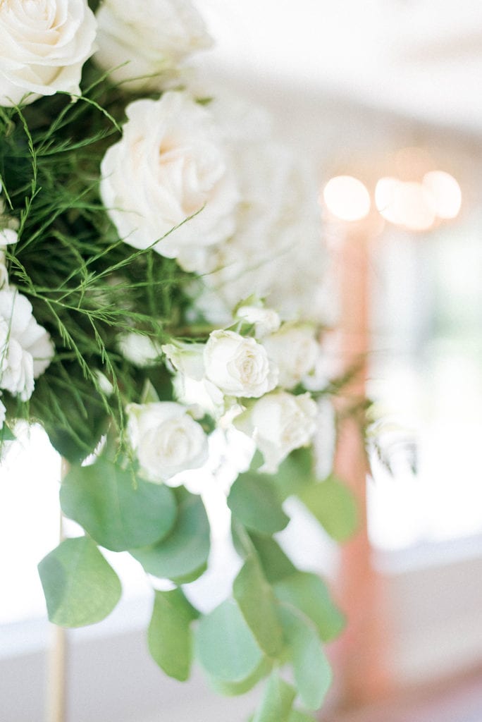 White and greenery wedding reception table tall centerpiece 