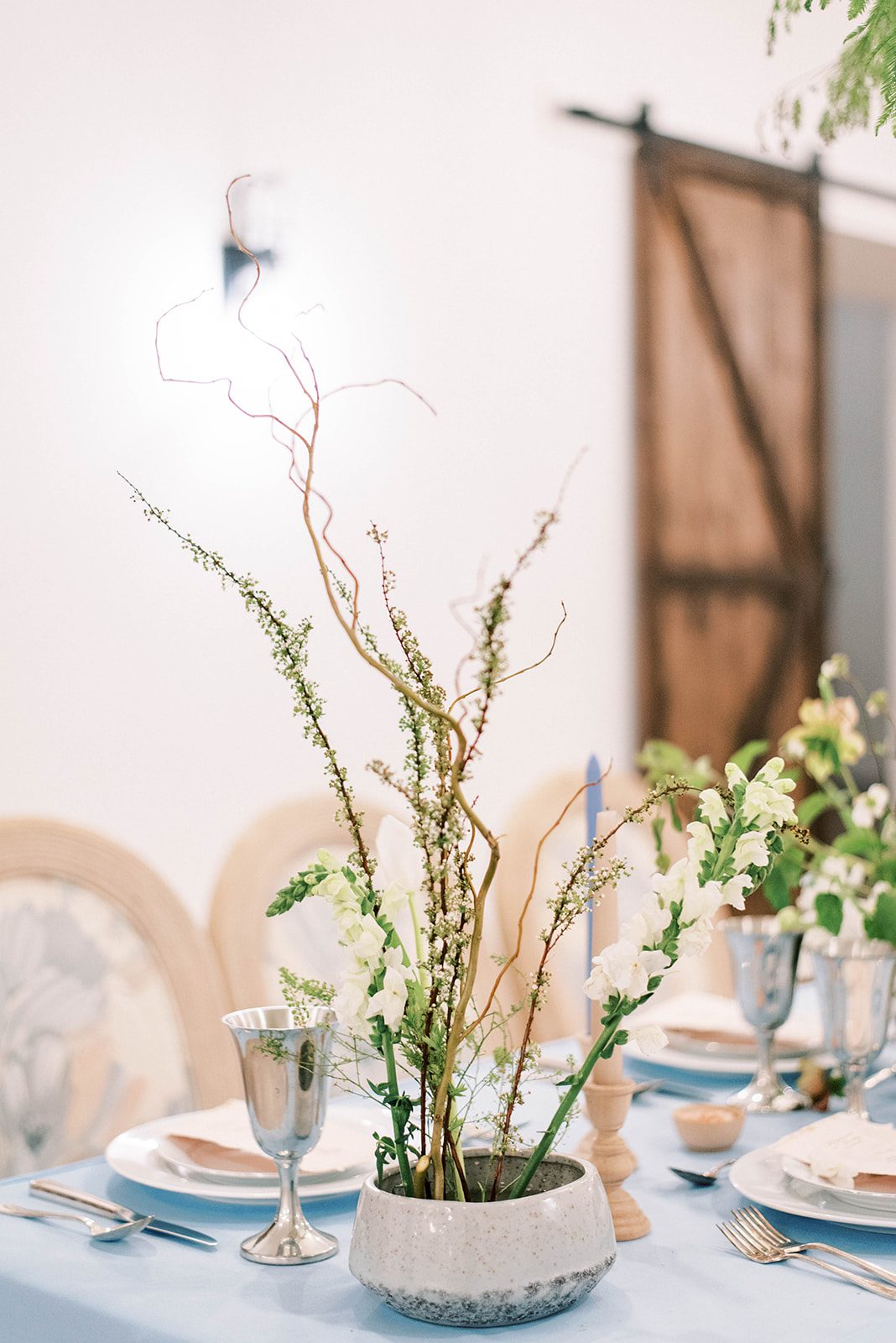 minimalist wedding style in Tampa Florida with natural rentals and simple greenery on a table for a reception