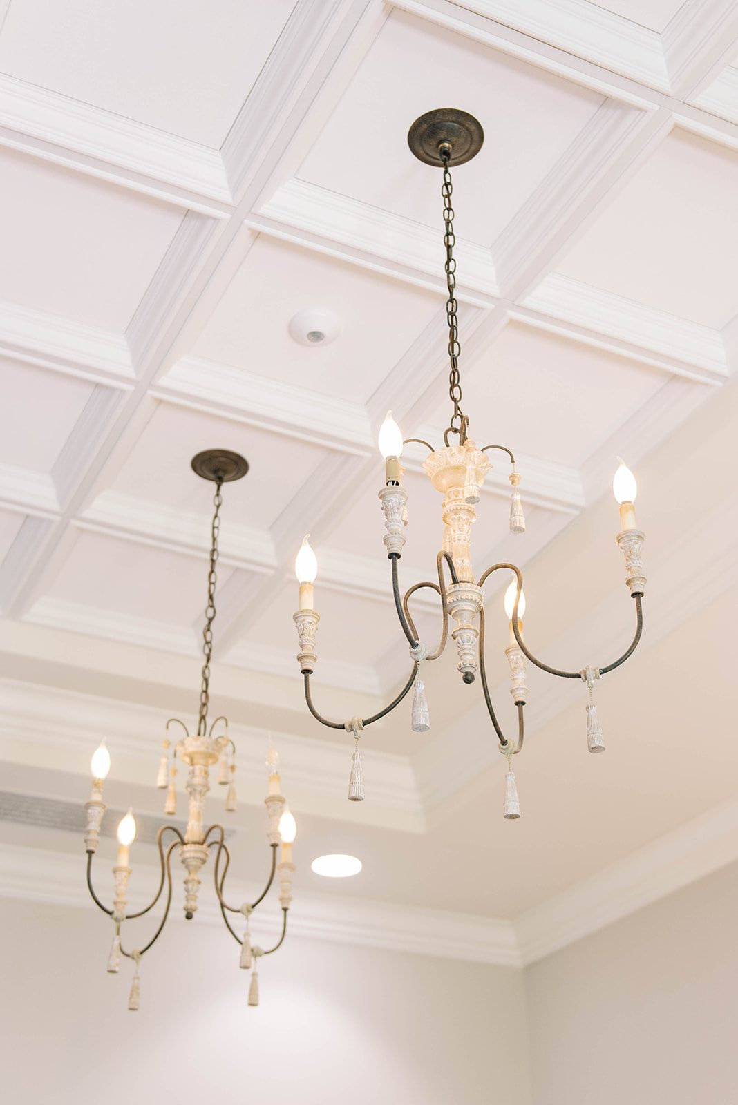 Harborview Chapel elegant details on the ceiling with simple chandeliers and crown molding