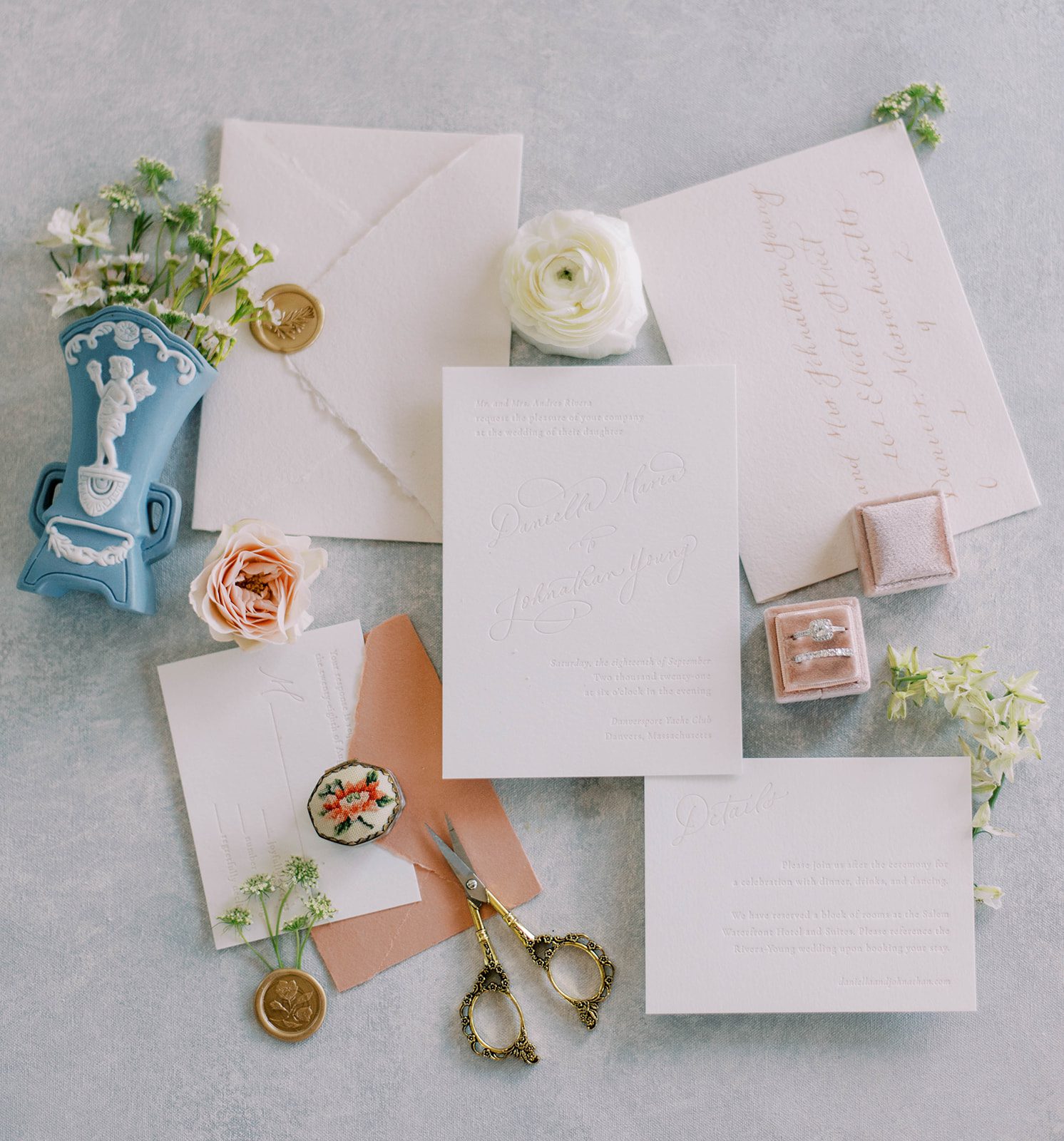 picture perfect wedding invitation with little rose florals and stunning blush pink accents