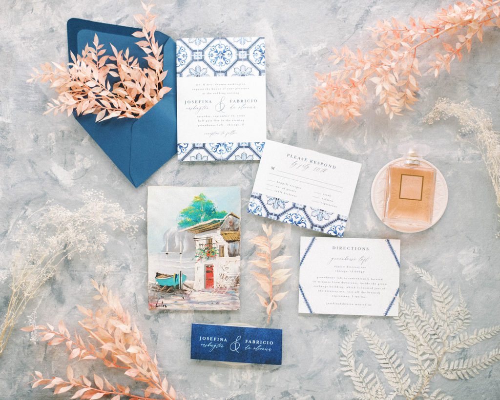 elegant blue and light pink picture perfect wedding invitations styled by Tampa wedding photographers for a perfect flatlay shot