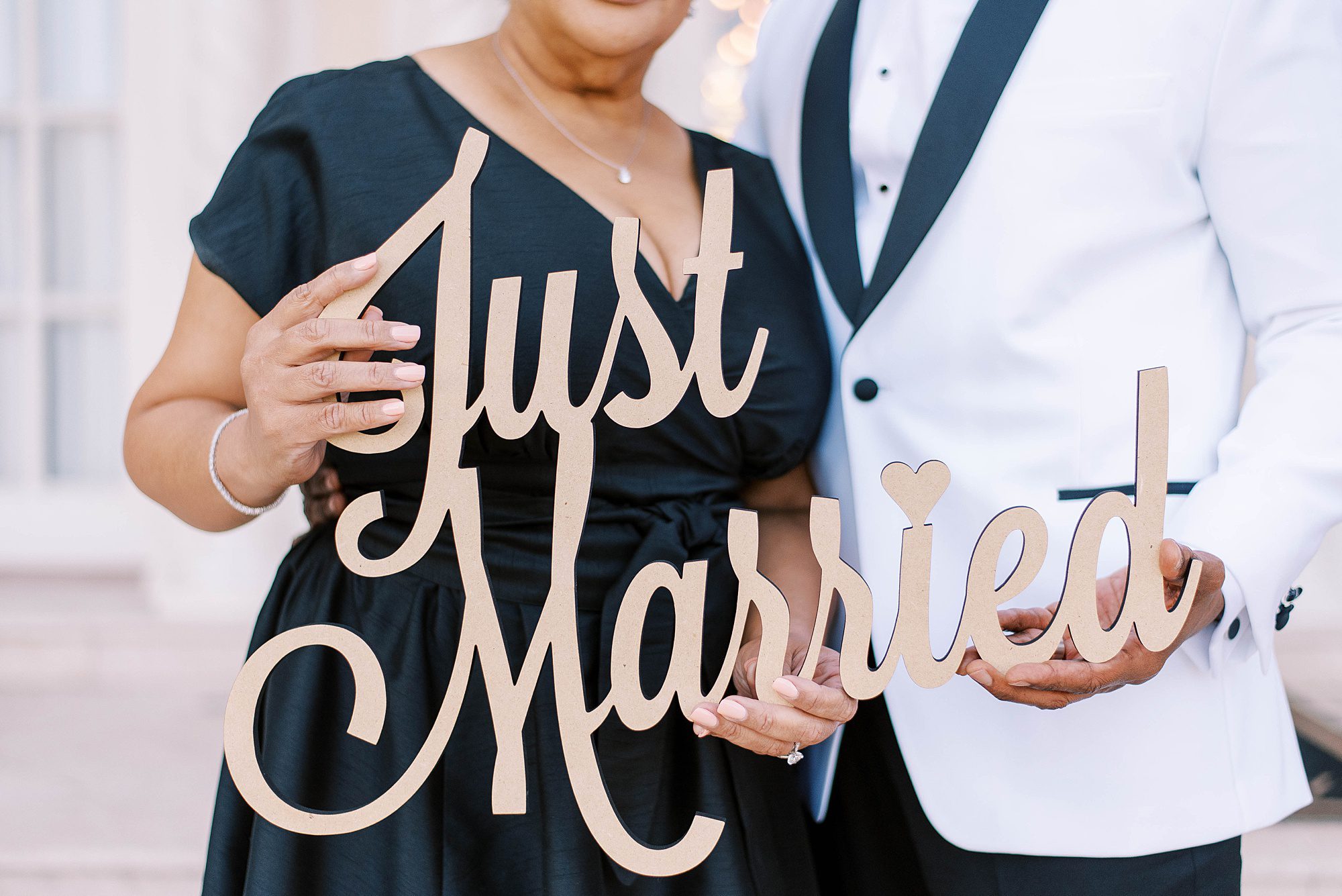 couple holds "just married" sign on Davis Island