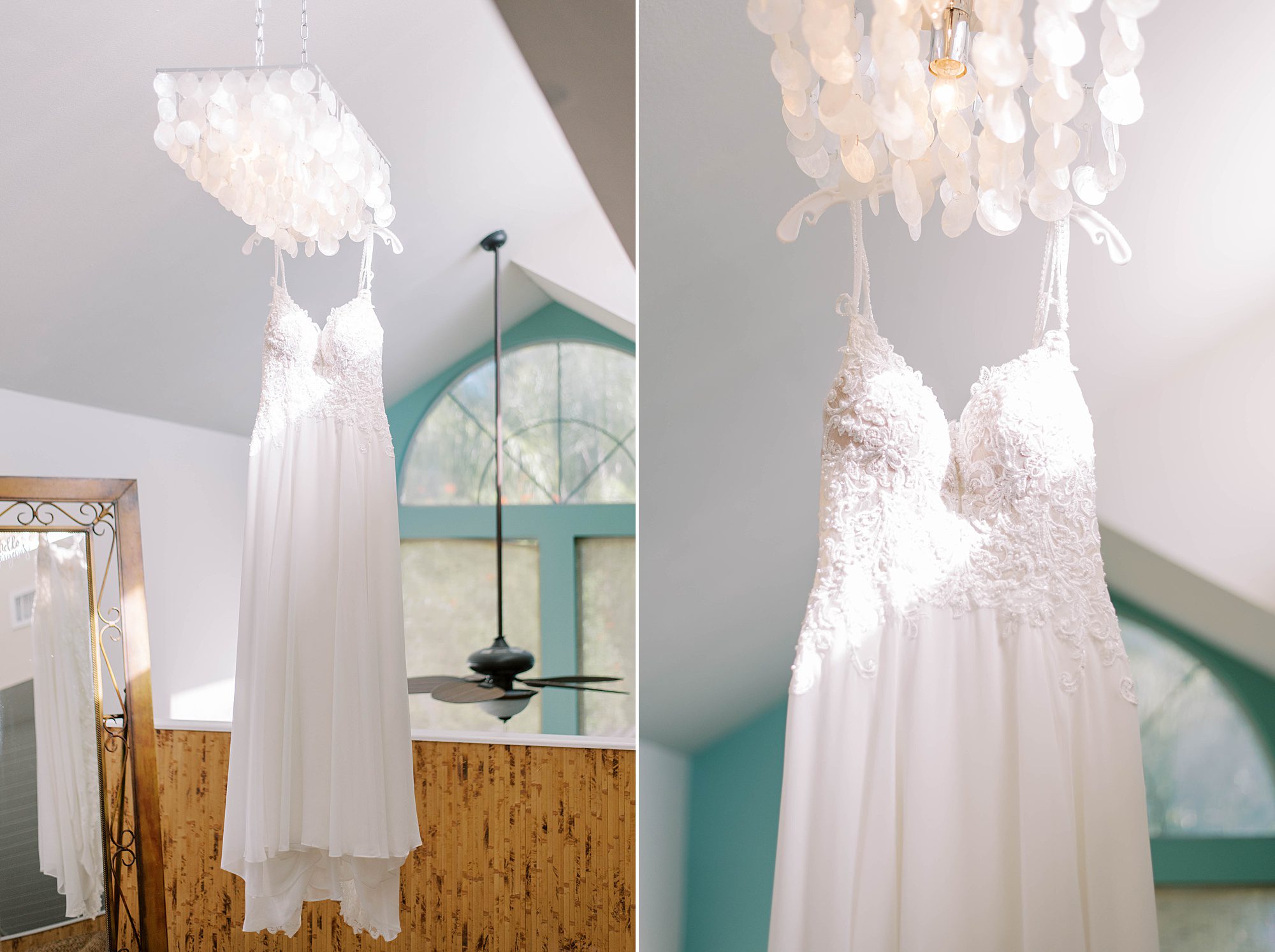 bride's wedding dress hangs from chandelier