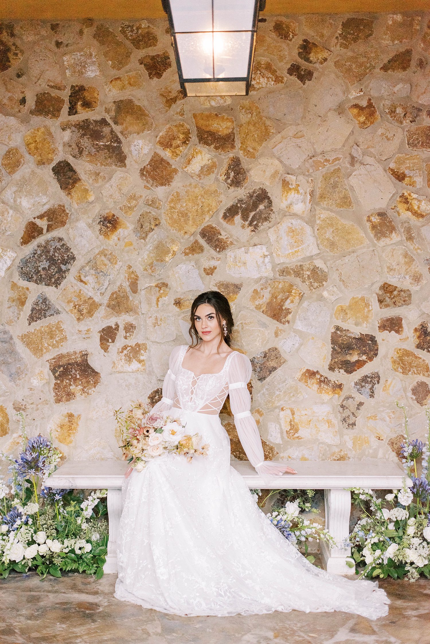 bride poses in elegant bridal gown for intimate wedding day