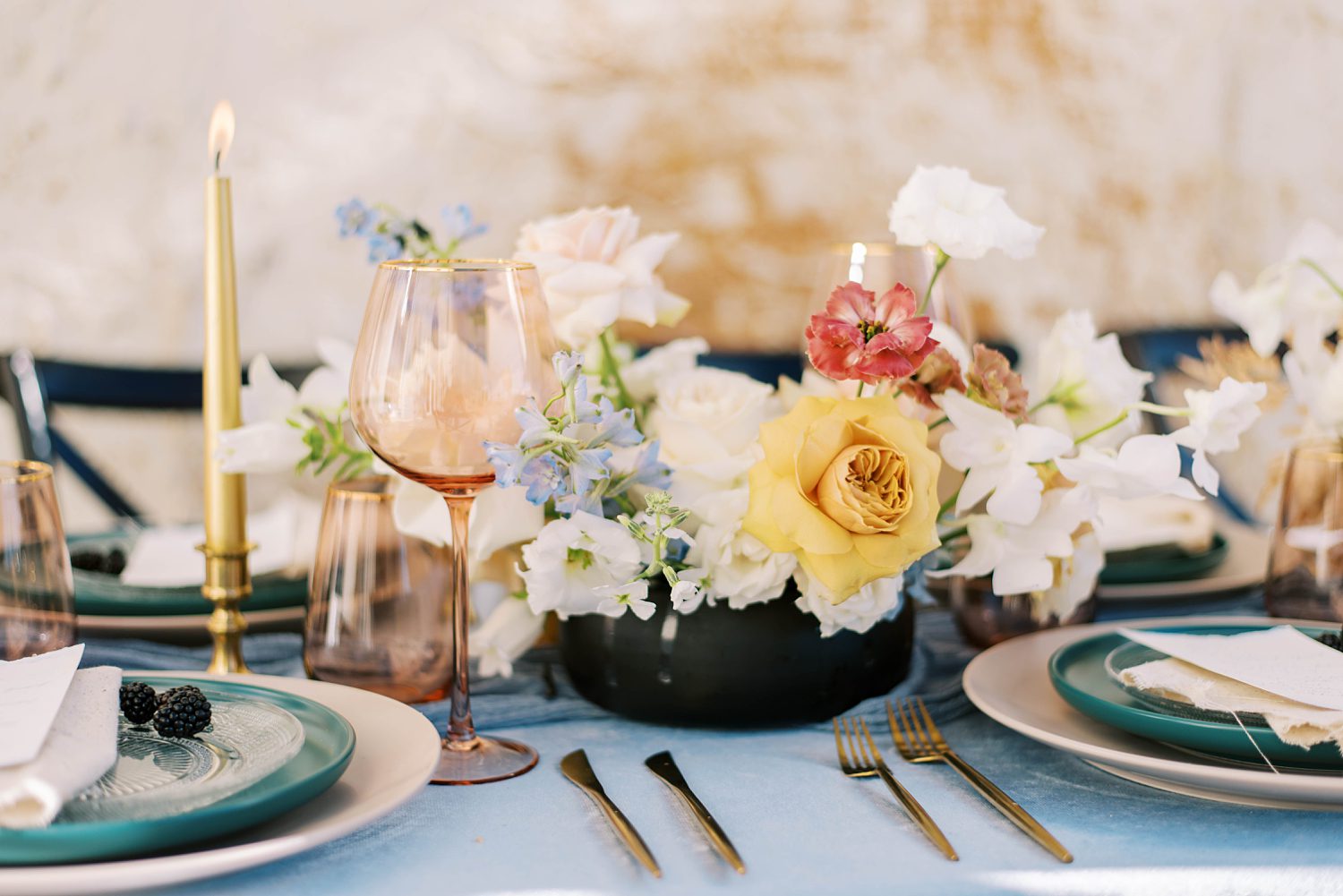 centerpieces with yellow and white flowers at BellaCosa Lakeside wedding