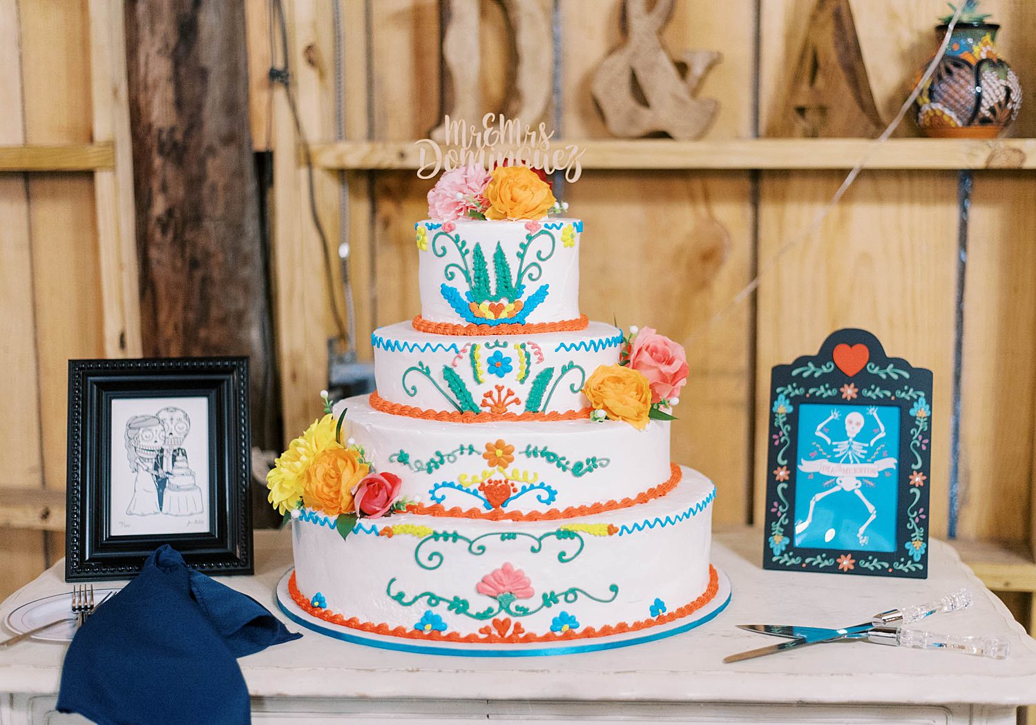 tiered wedding cake with traditional Mexican colors and designs