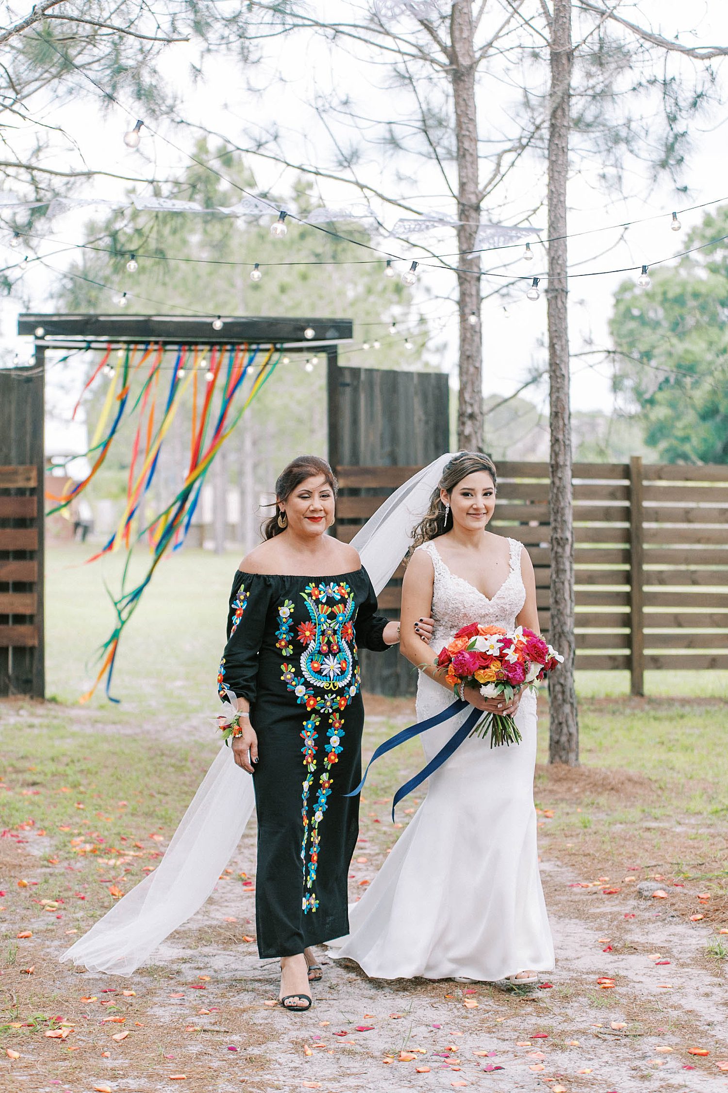 bride and mother walk down aisle in Parrish FL