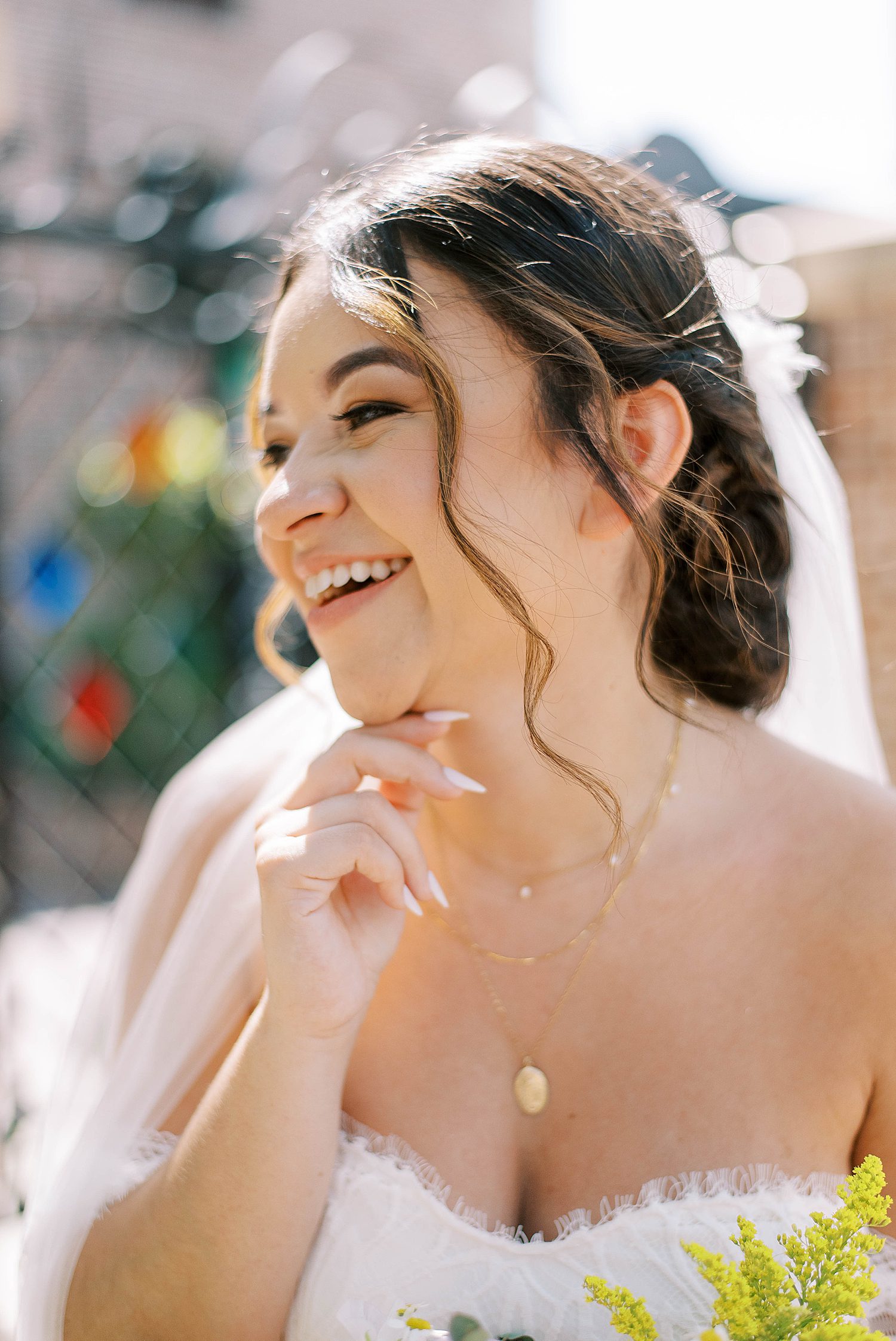 bride laughs during FL wedding portraits