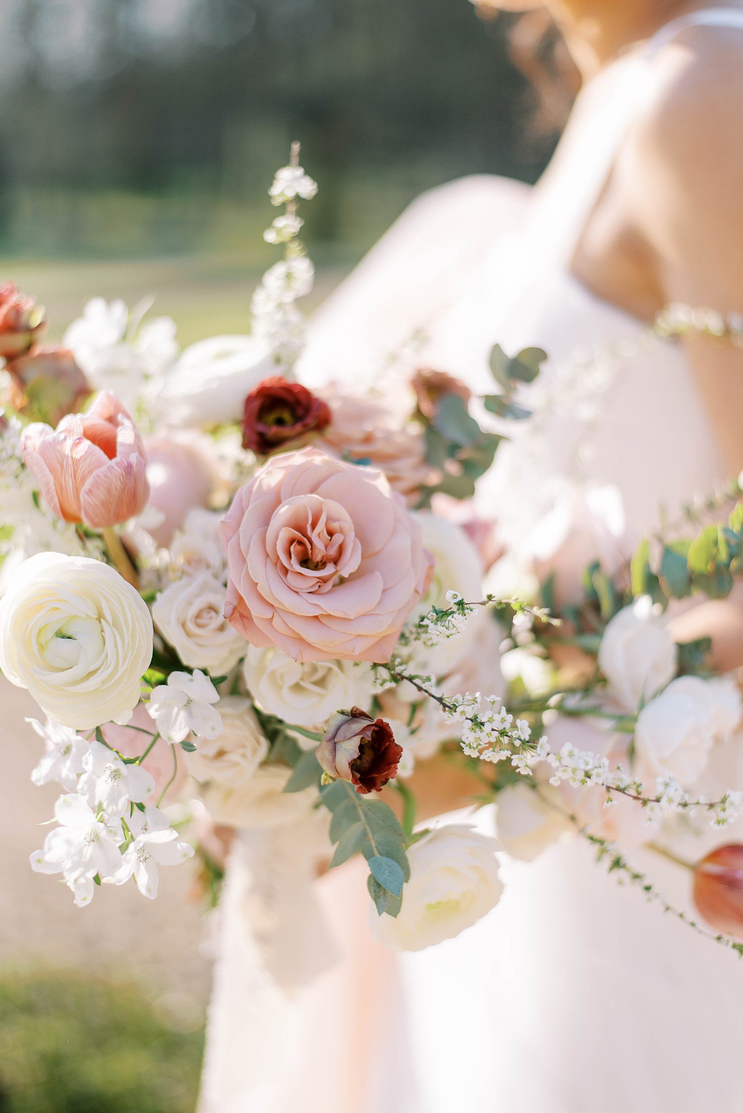 bride's pink and white bouquet for spring wedding day in France