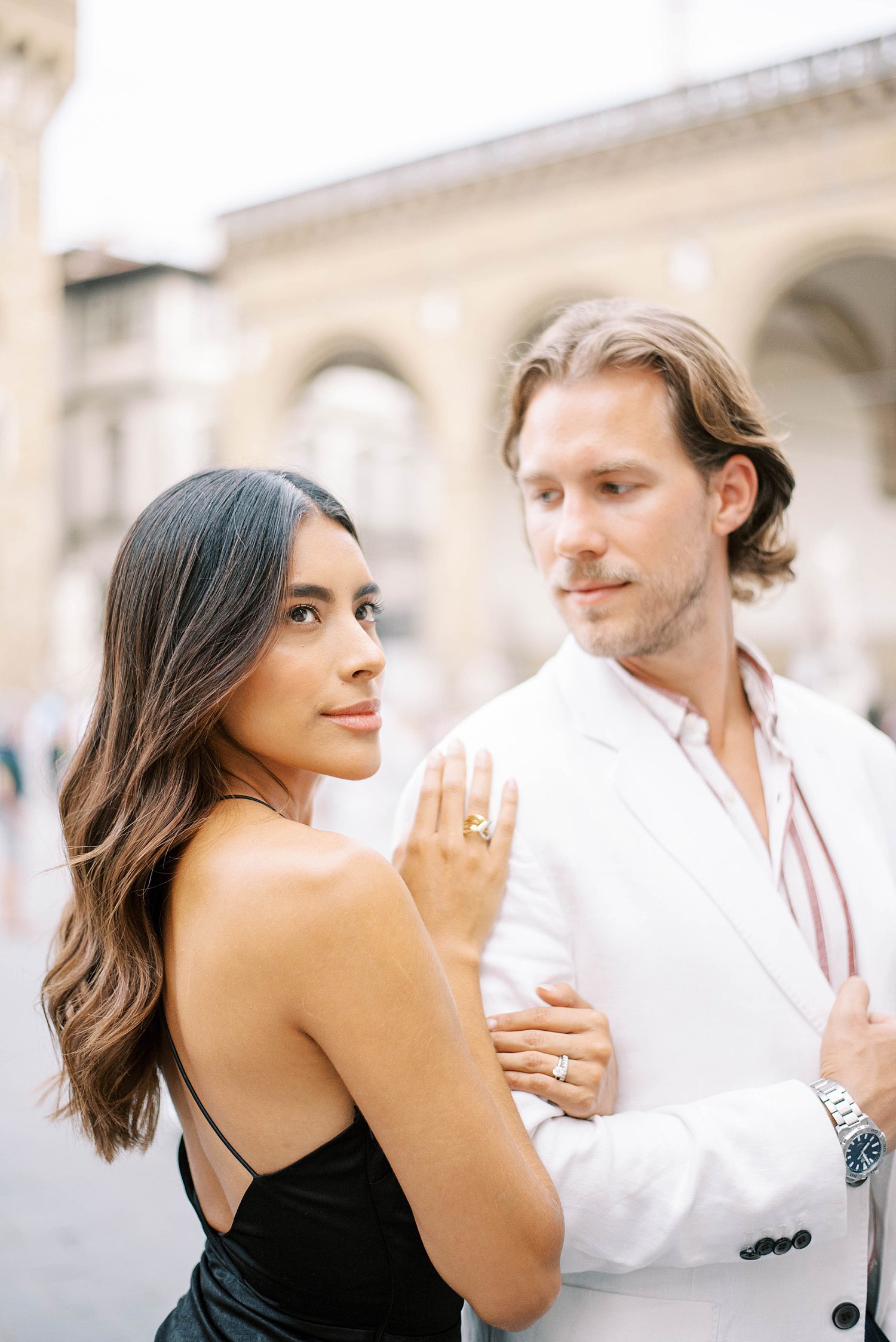 Florence wedding photographer captures couple posing in Italian plaza