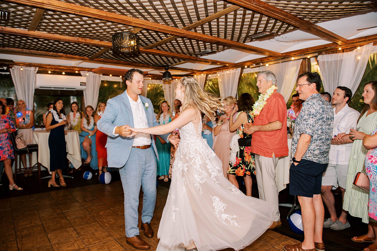 newlyweds dance together during Cafe Gabbiano wedding reception
