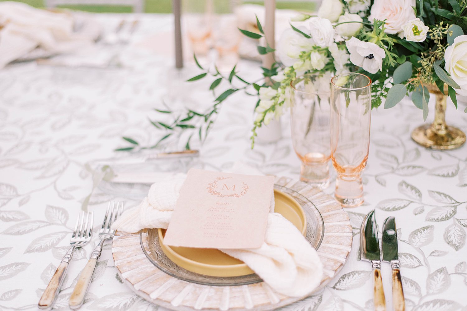 gold and pink place settings for garden wedding at Bella Collina