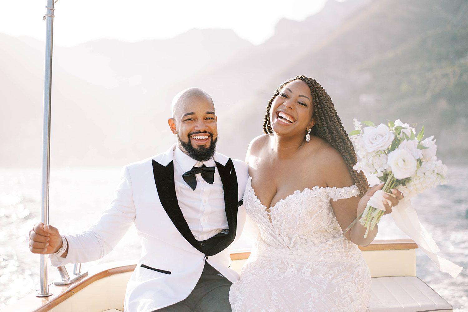 bride and groom laugh during Amalfi Coast elopement portraits