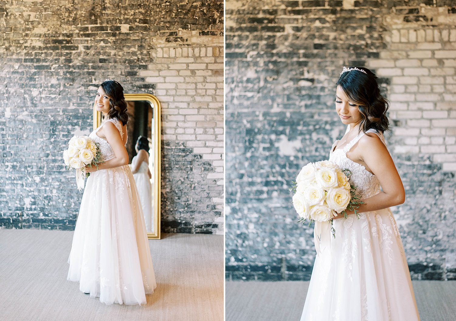 bride looks at ivory bouquet in front of brick wall