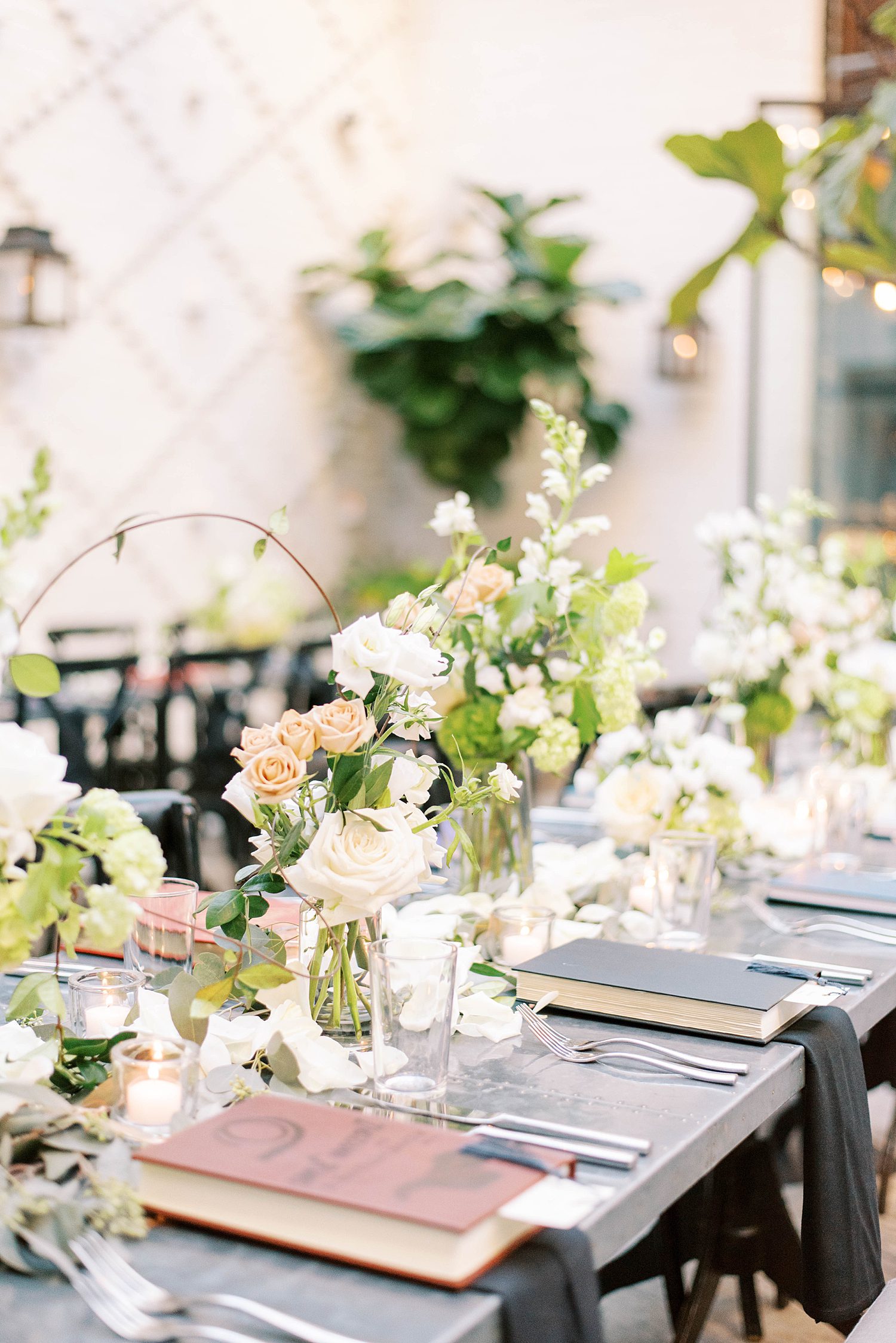 pastel floral arrangements on reception tables at Oxford Exchange