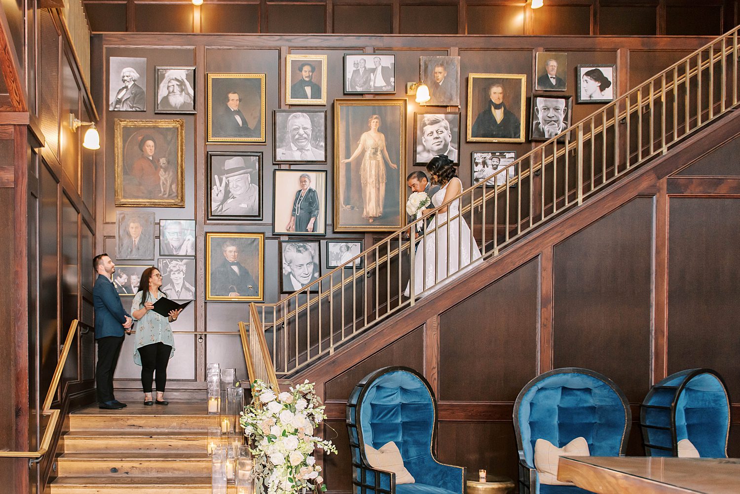father walks bride down staircase for Oxford Exchange wedding ceremony