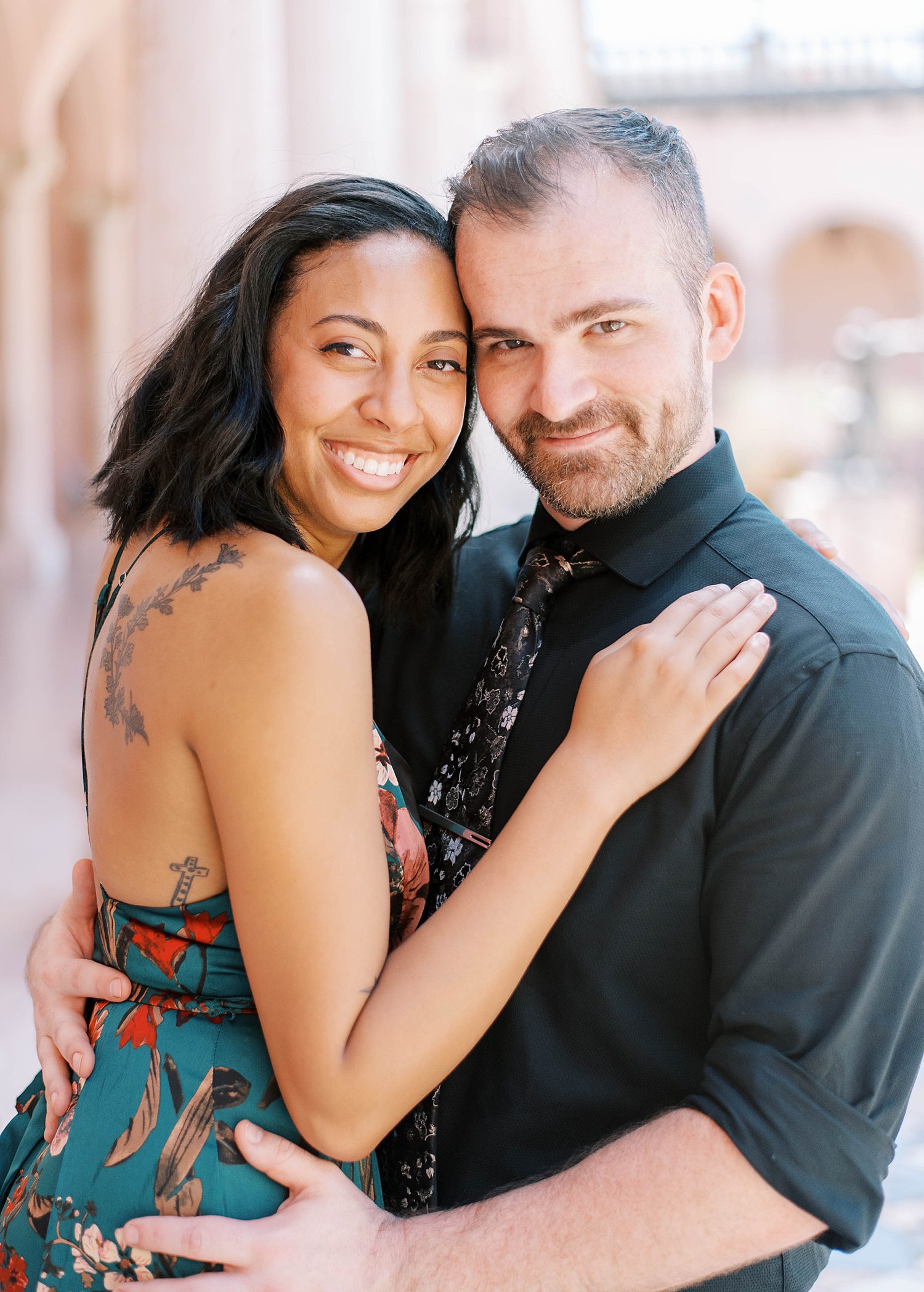 engaged couple hugs during Sarasota FL engagement photos