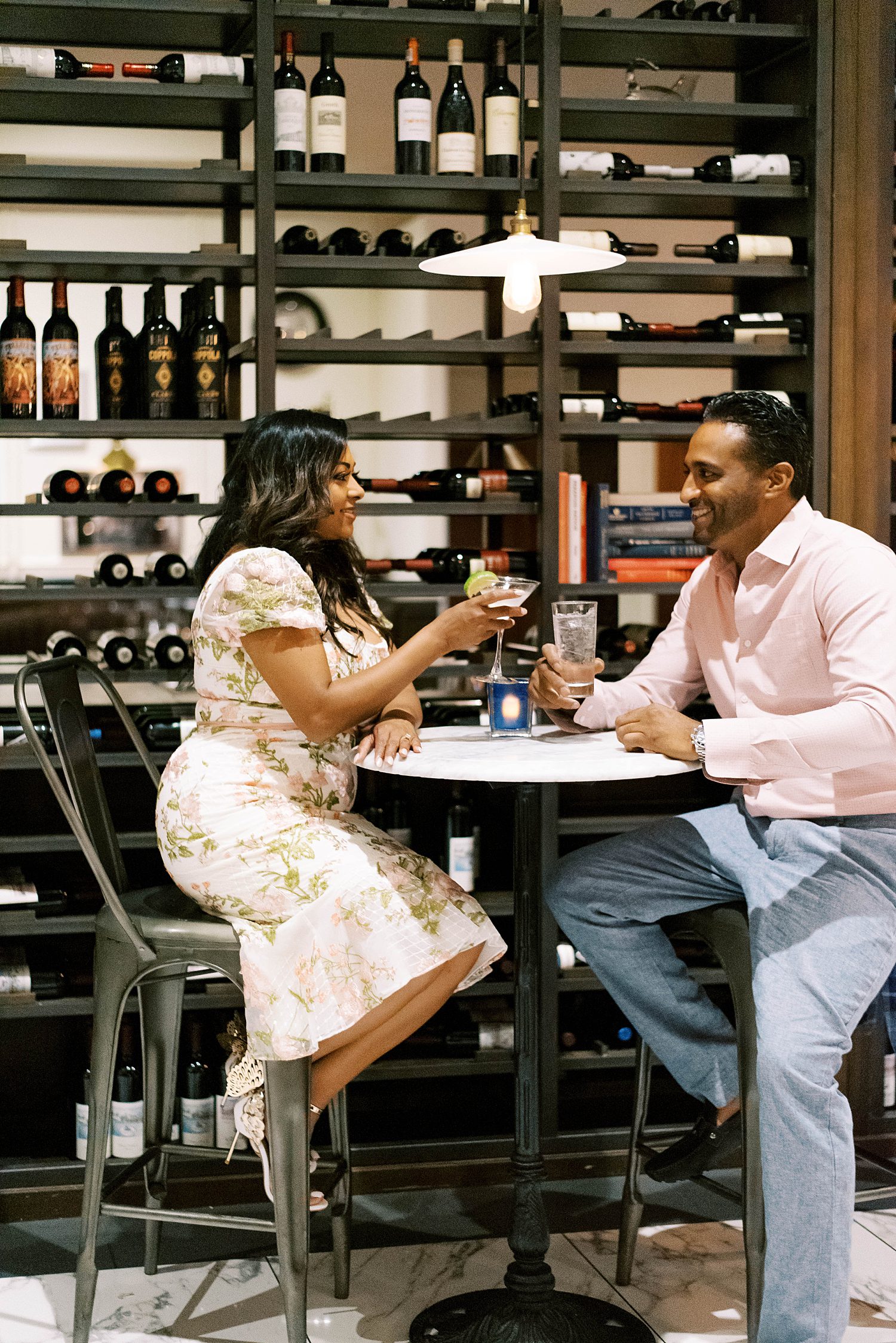 couple laughs together in bar in Downtown Tampa FL