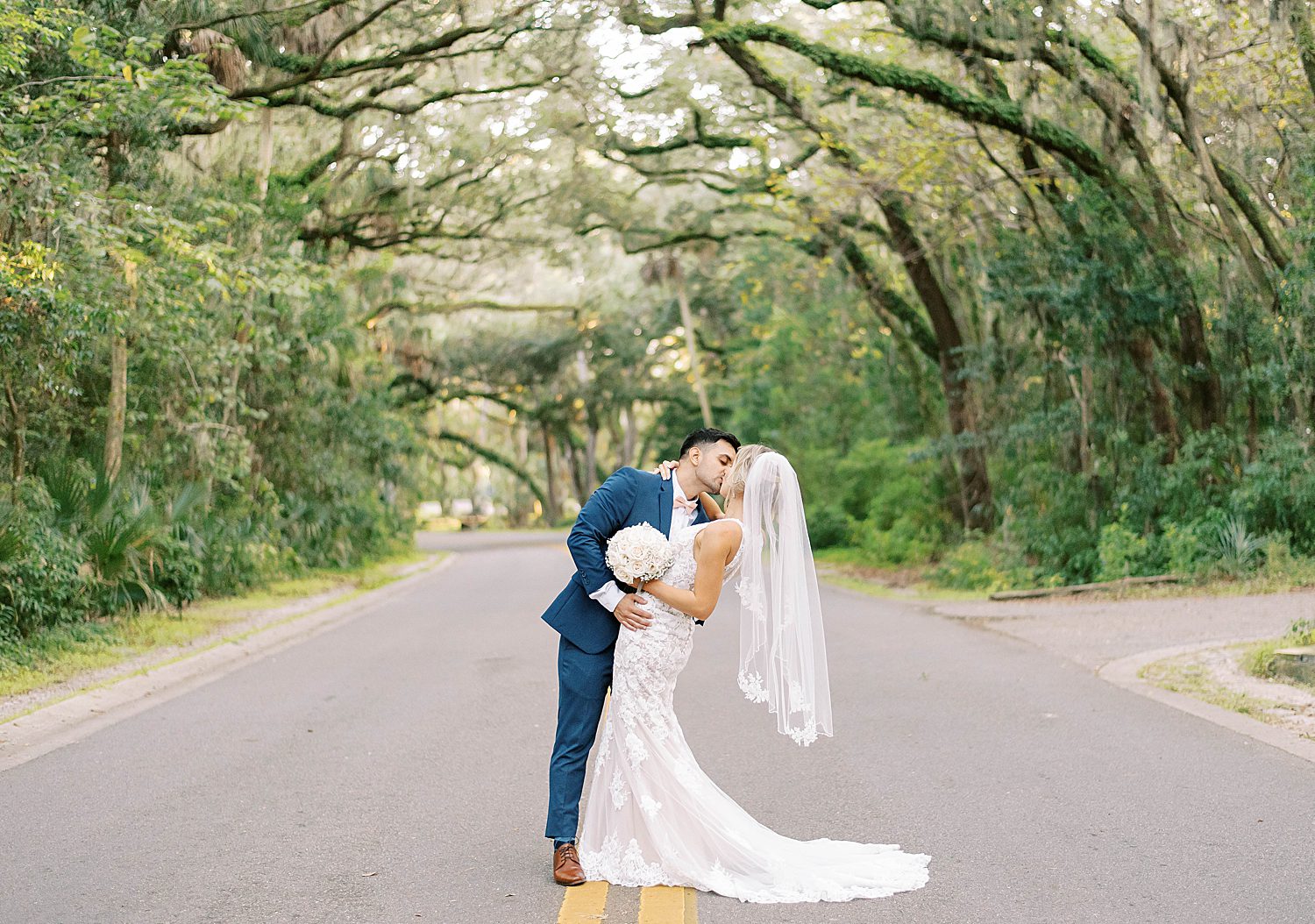 bride and groom kiss during intimate micro wedding in Tampa FL