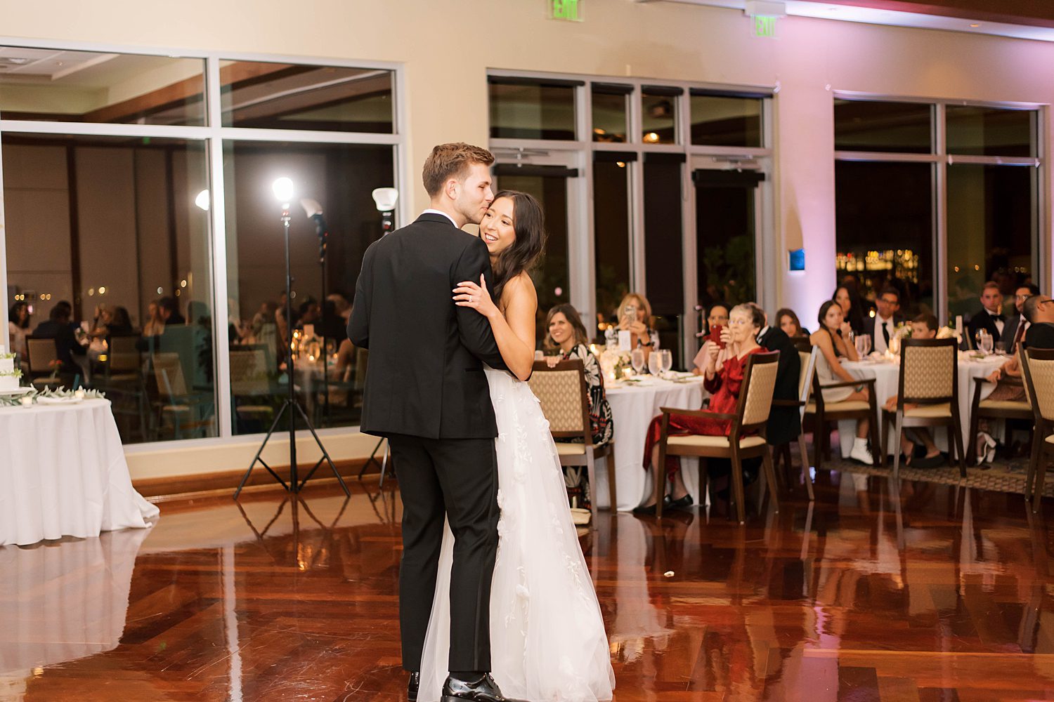 bride and groom have first dance at Sarasota Yacht Club