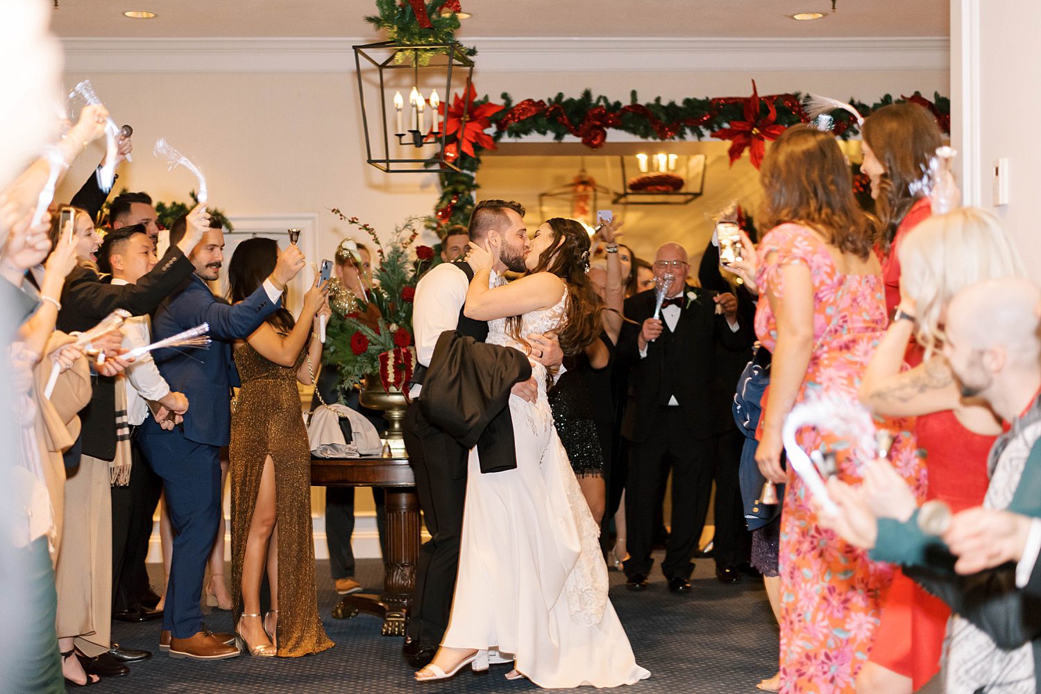 bride and groom kiss during exit from Palma Ceia Country Club wedding