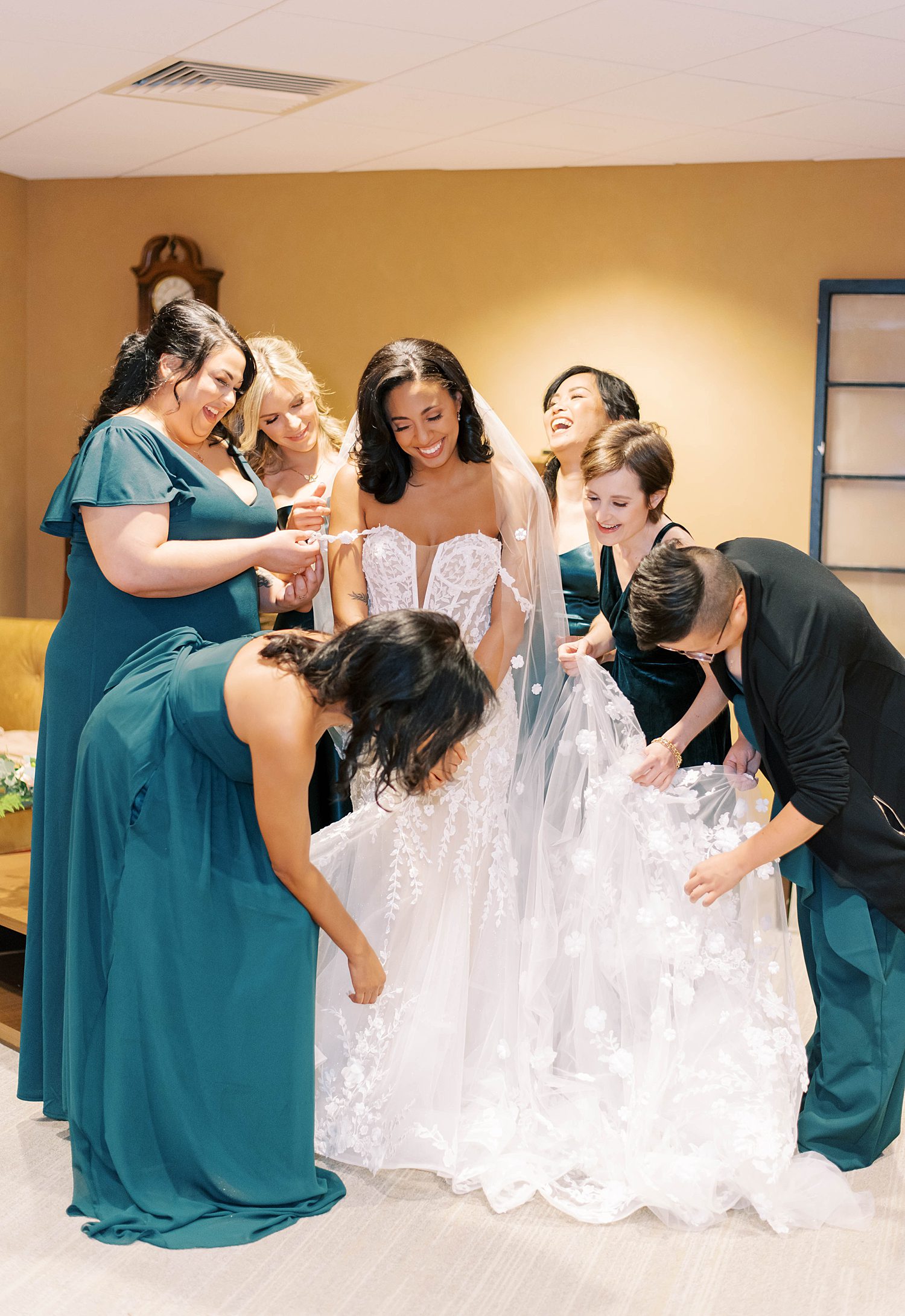 bridesmaids help bride prepare for FL wedding day
