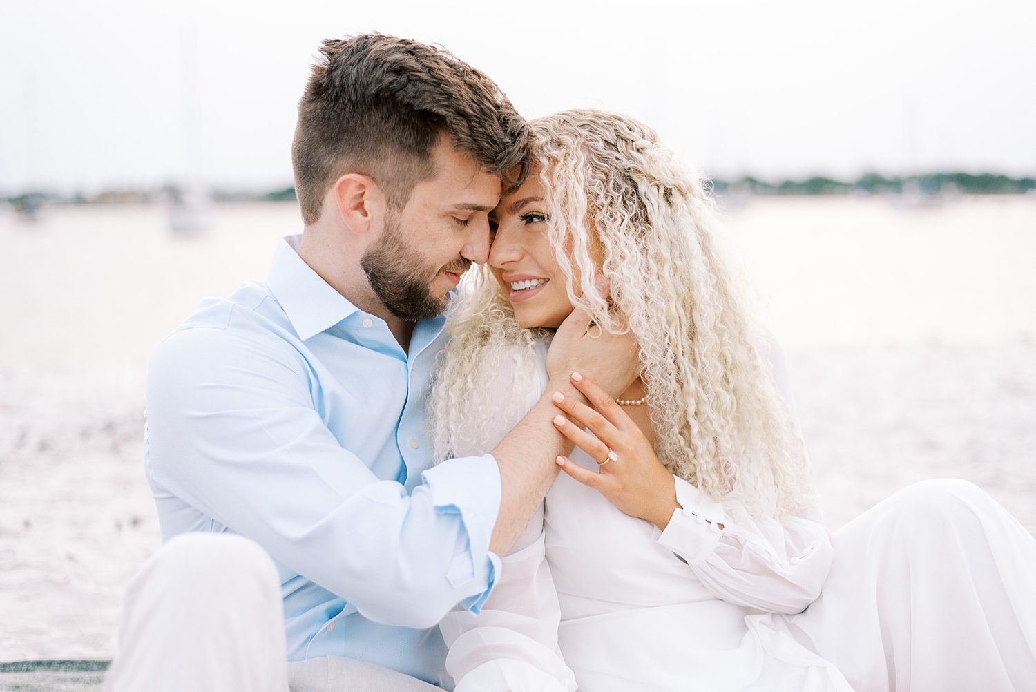 man holds woman's chin on Davis Island