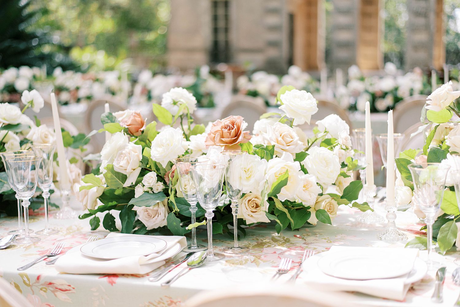 wedding reception table with pink and white roses at Vizcaya Museum