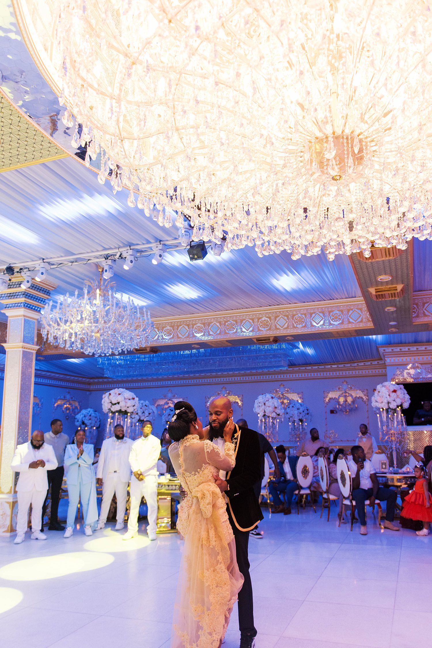 bride and groom dance during reception in ballroom at Chic Venue Golden Palace