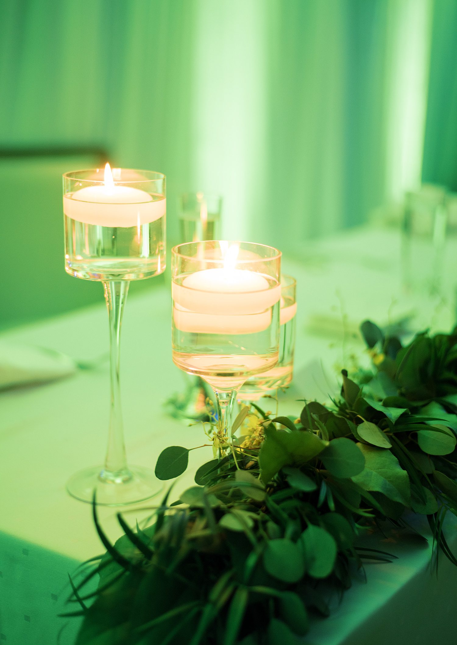 floating candles and greenery on sweetheart table at the Hyatt Clearwater