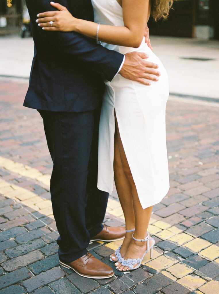 Curtis Hixon Park Engagement Session Film Photo of bride and groom embracing each other