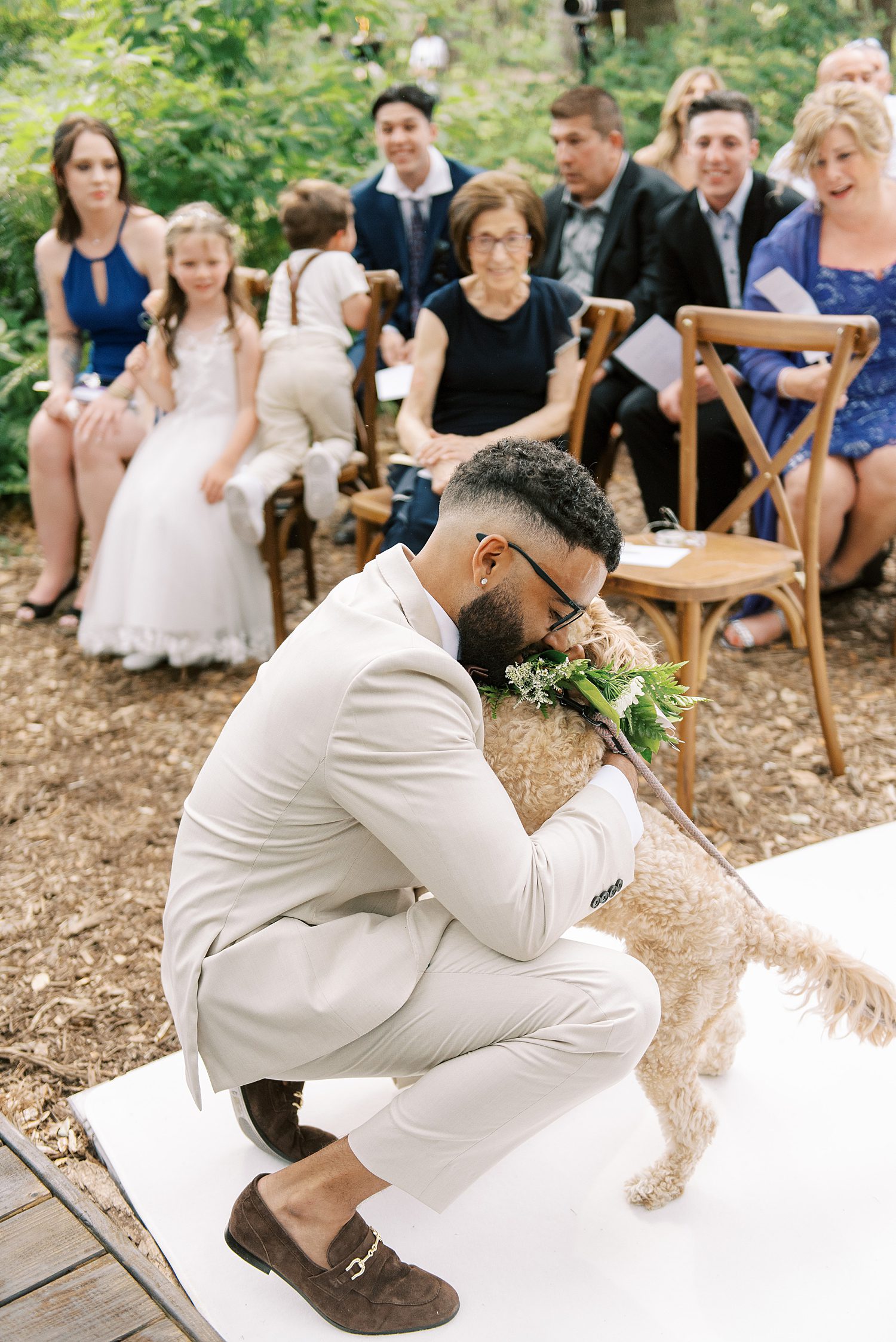 groom pets dog at end of aisle in Georgia