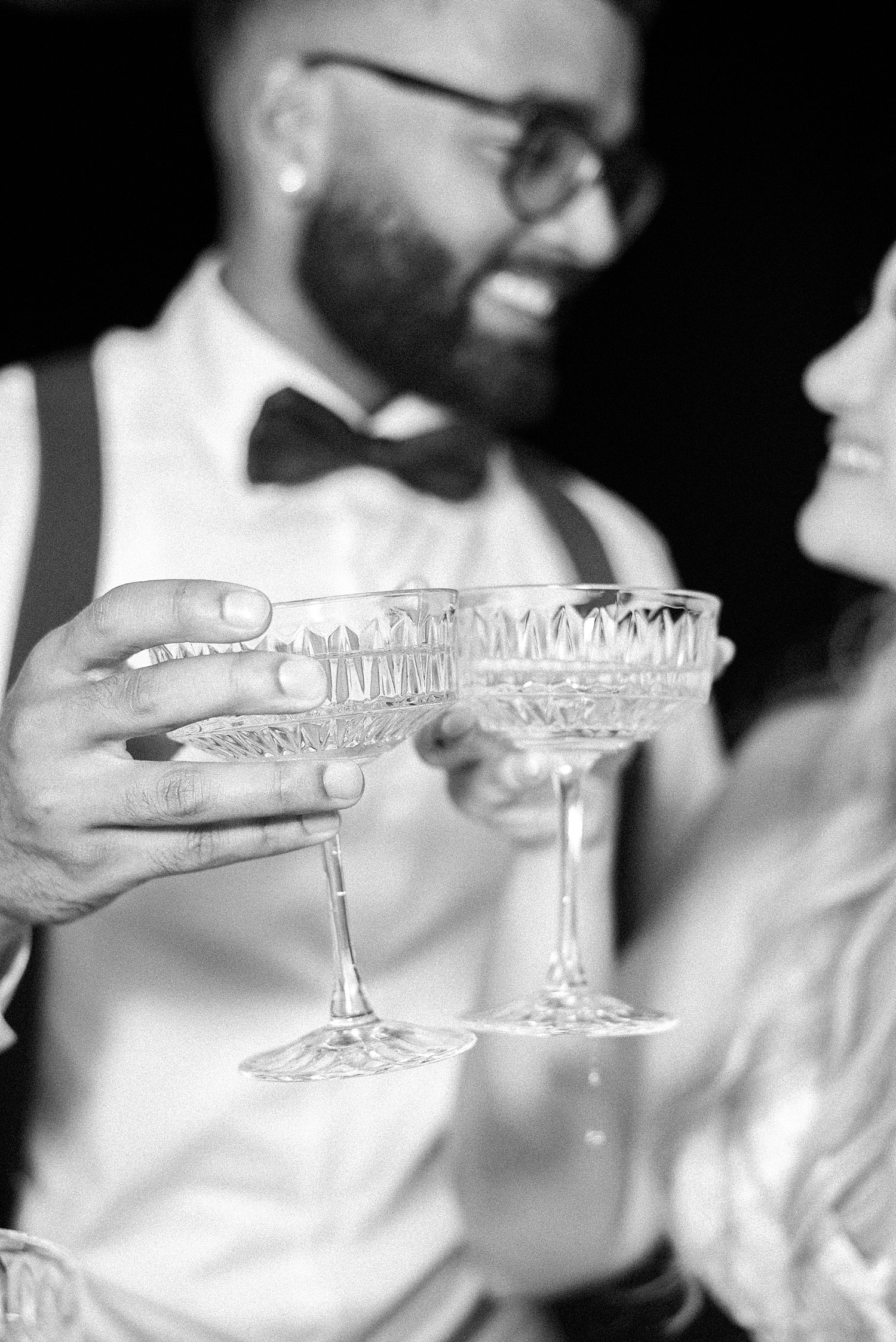 bride and groom toast champagne during reception at Mill Pond Estate