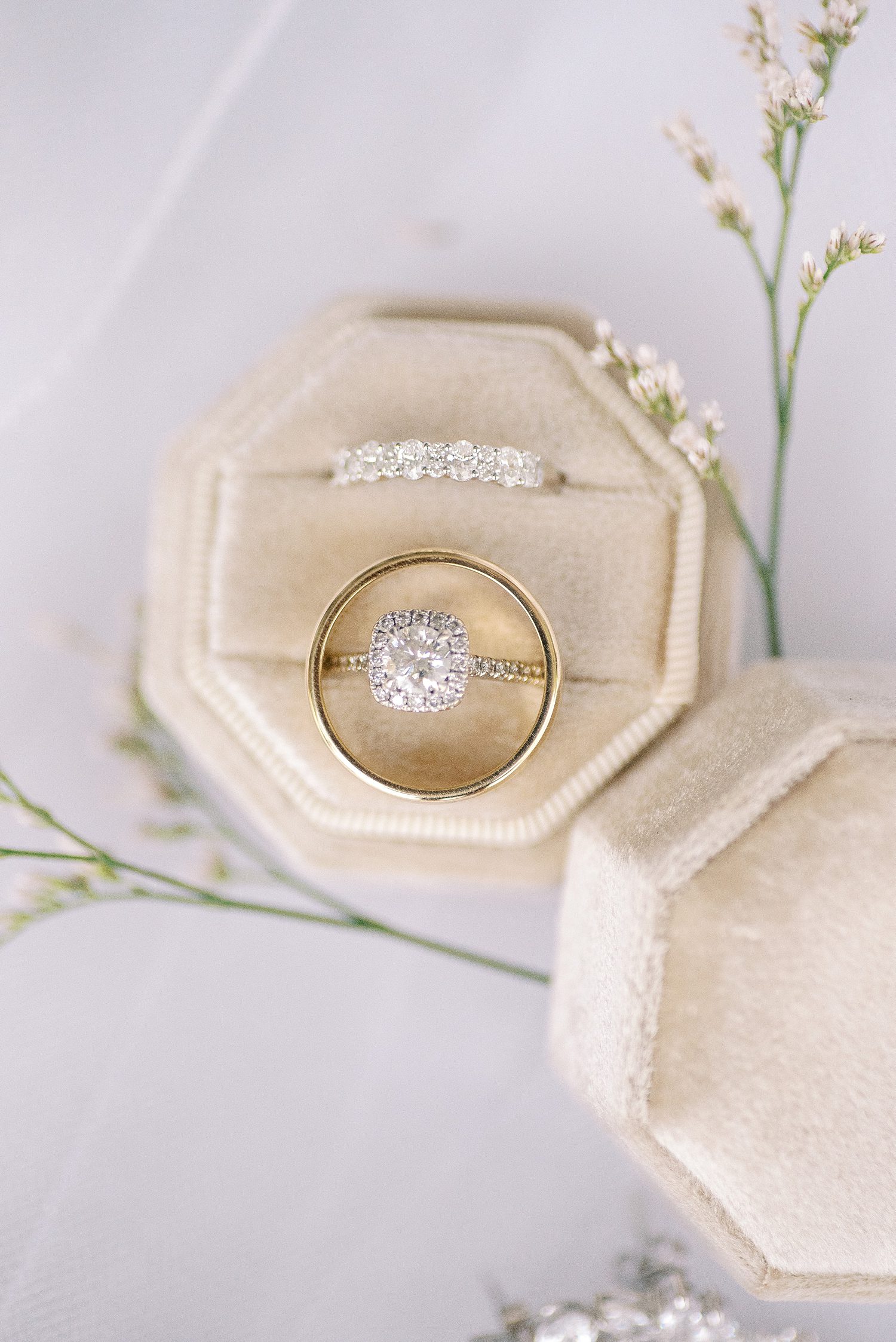 diamond ring rests on ivory ring box in Tampa Bay FL