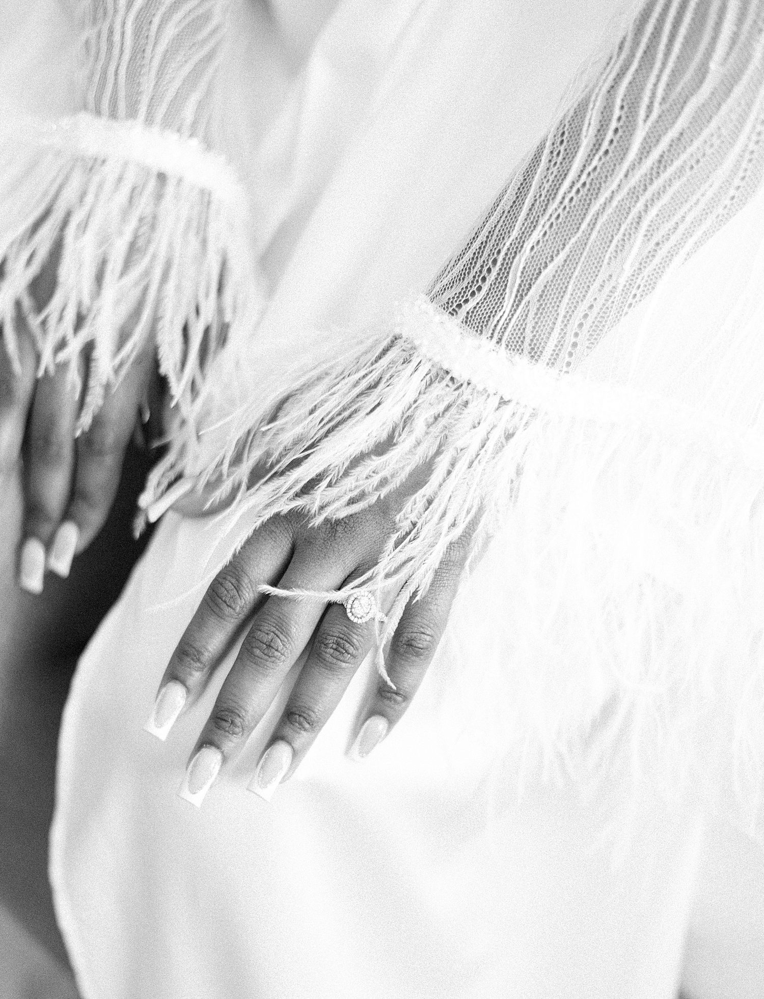 feather details on bride's getting ready robe for FL wedding day