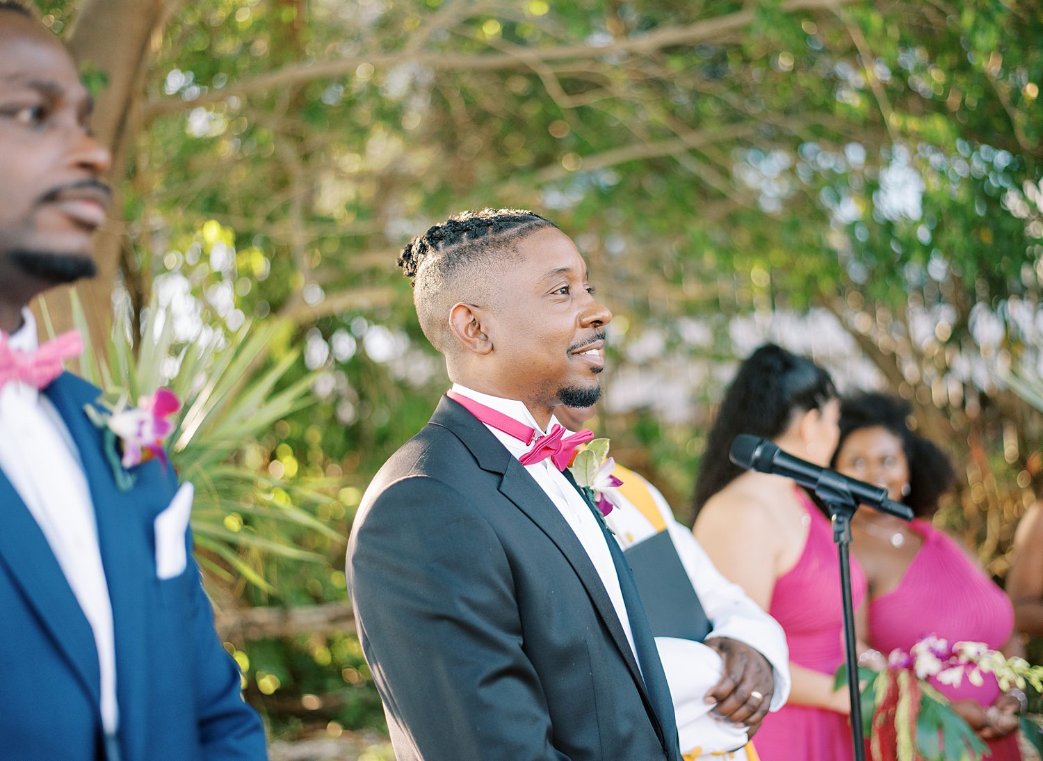 groom cries watching bride walk down aisle before Tampa wedding ceremony 