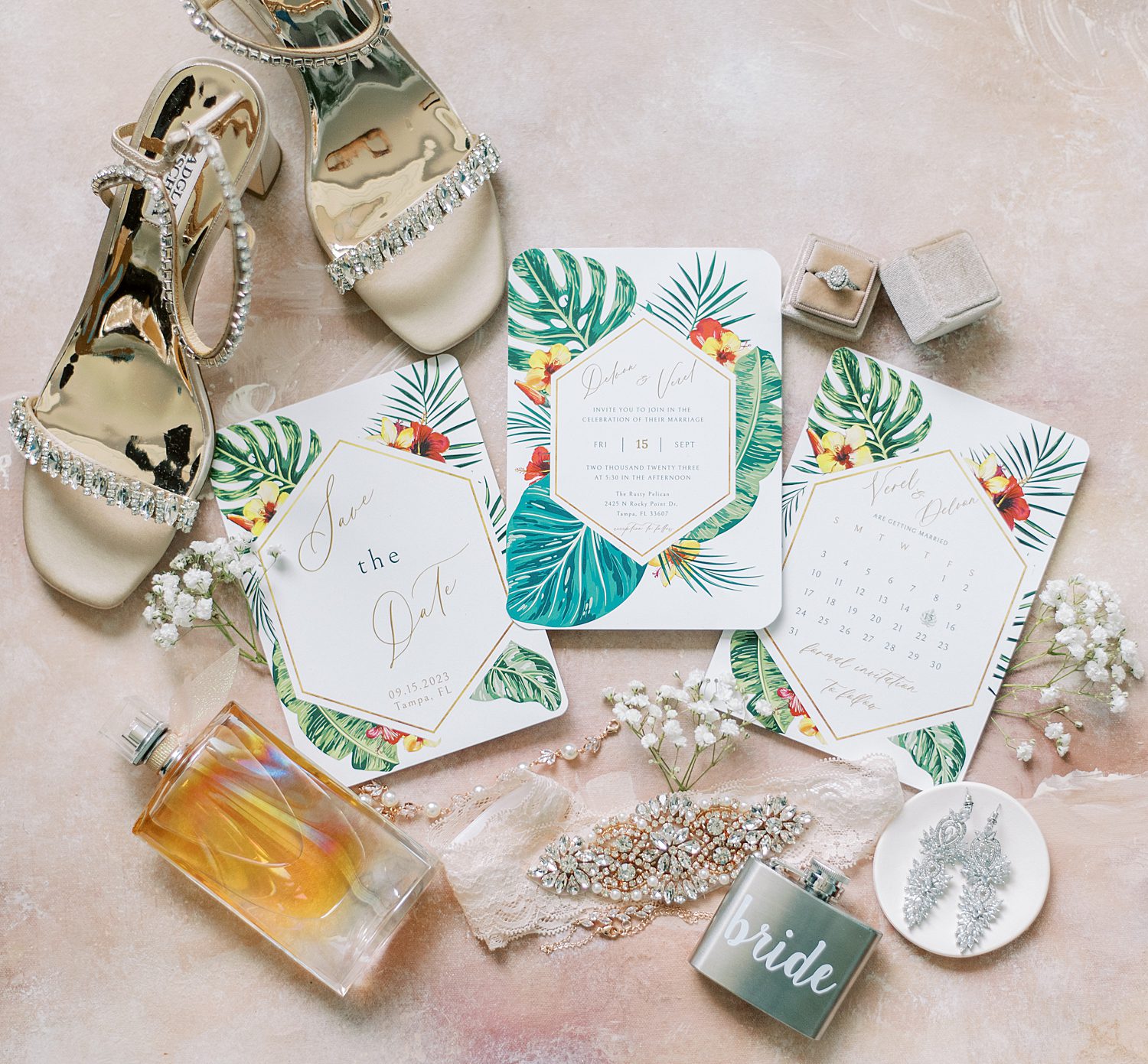 tropical wedding stationery for Florida wedding with bride's shoes and jewelry 