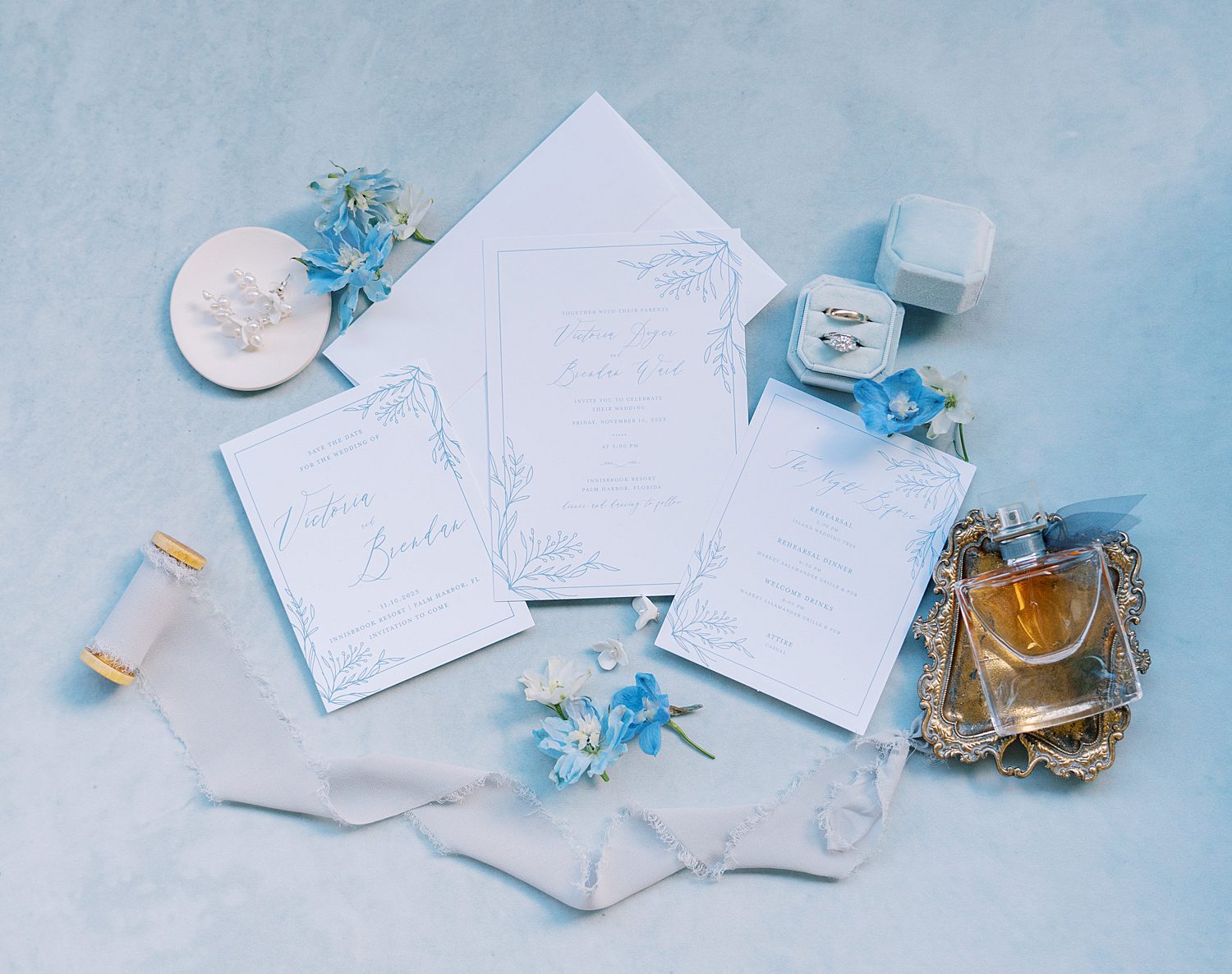 blue and white invitation suite for summer wedding at open air reception at Innisbrook Resort