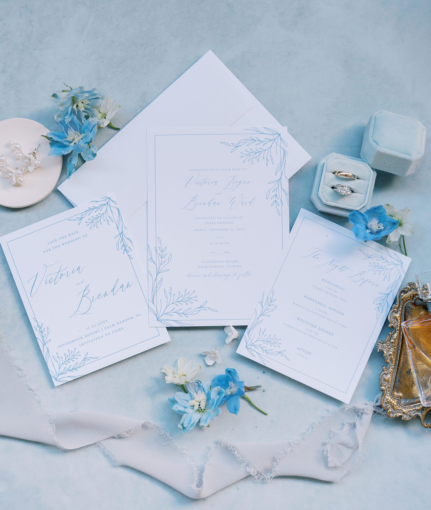 blue and white invitation suite for summer wedding at open air reception at Innisbrook Resort