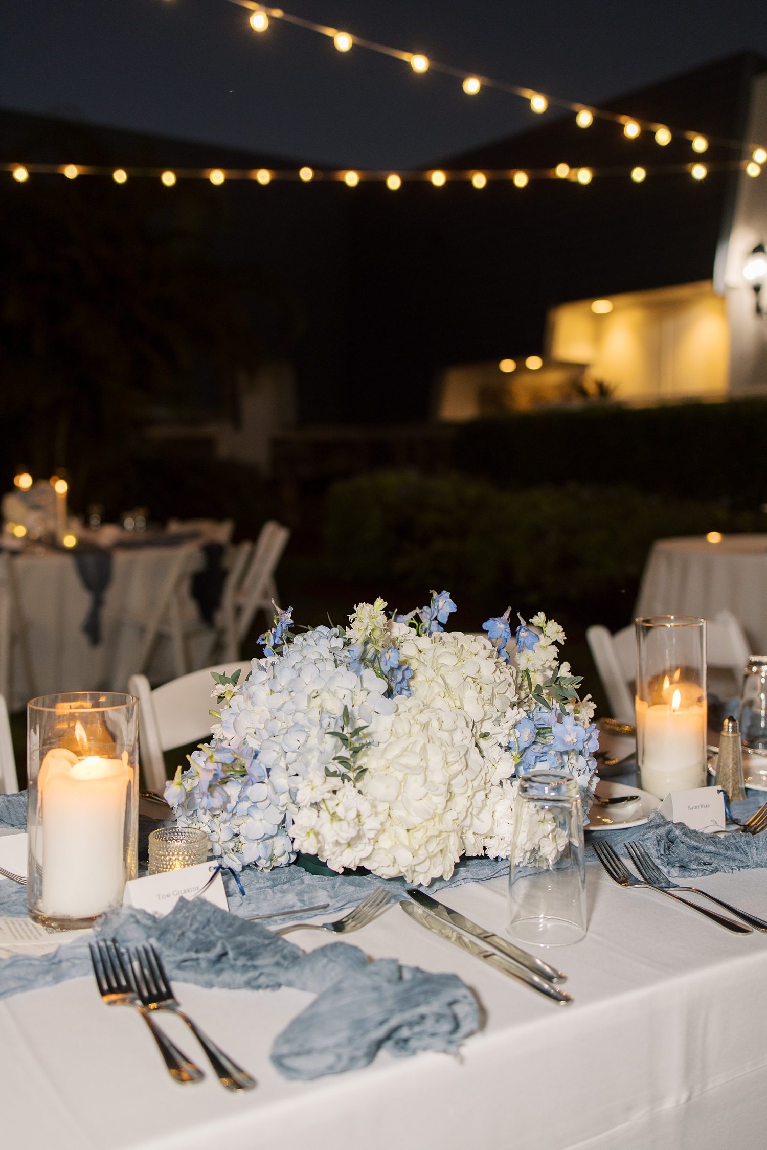 wedding reception at open air reception at Innisbrook Resort with white and blue flowers 