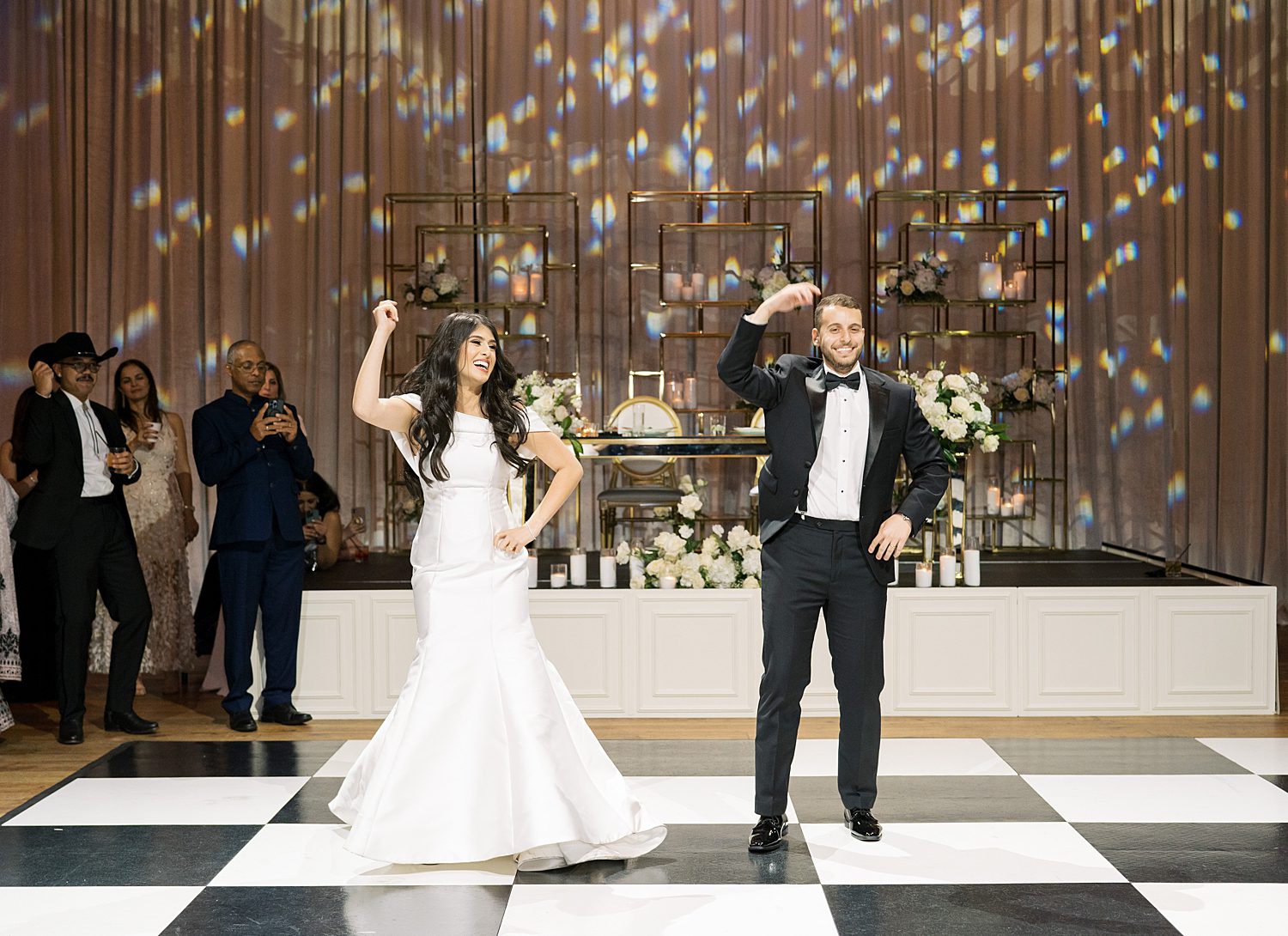 bride and groom dance on dance floor at Armature Works