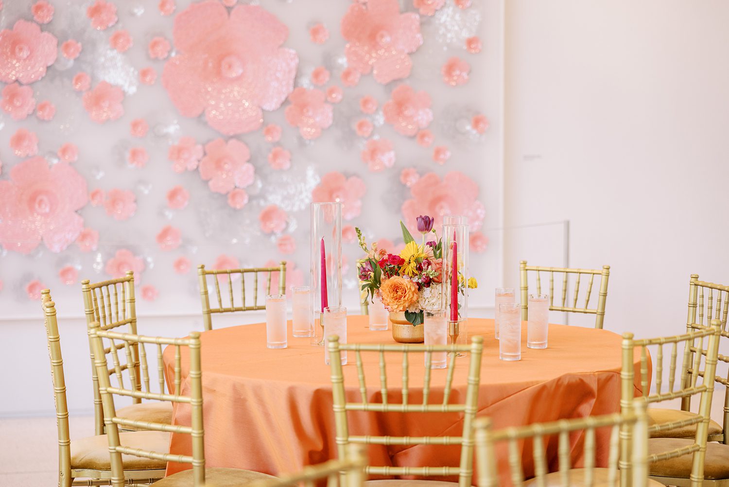 coral, bright pink, and white floral decorations for reception of Mehndi Day at the Tampa Museum of Art